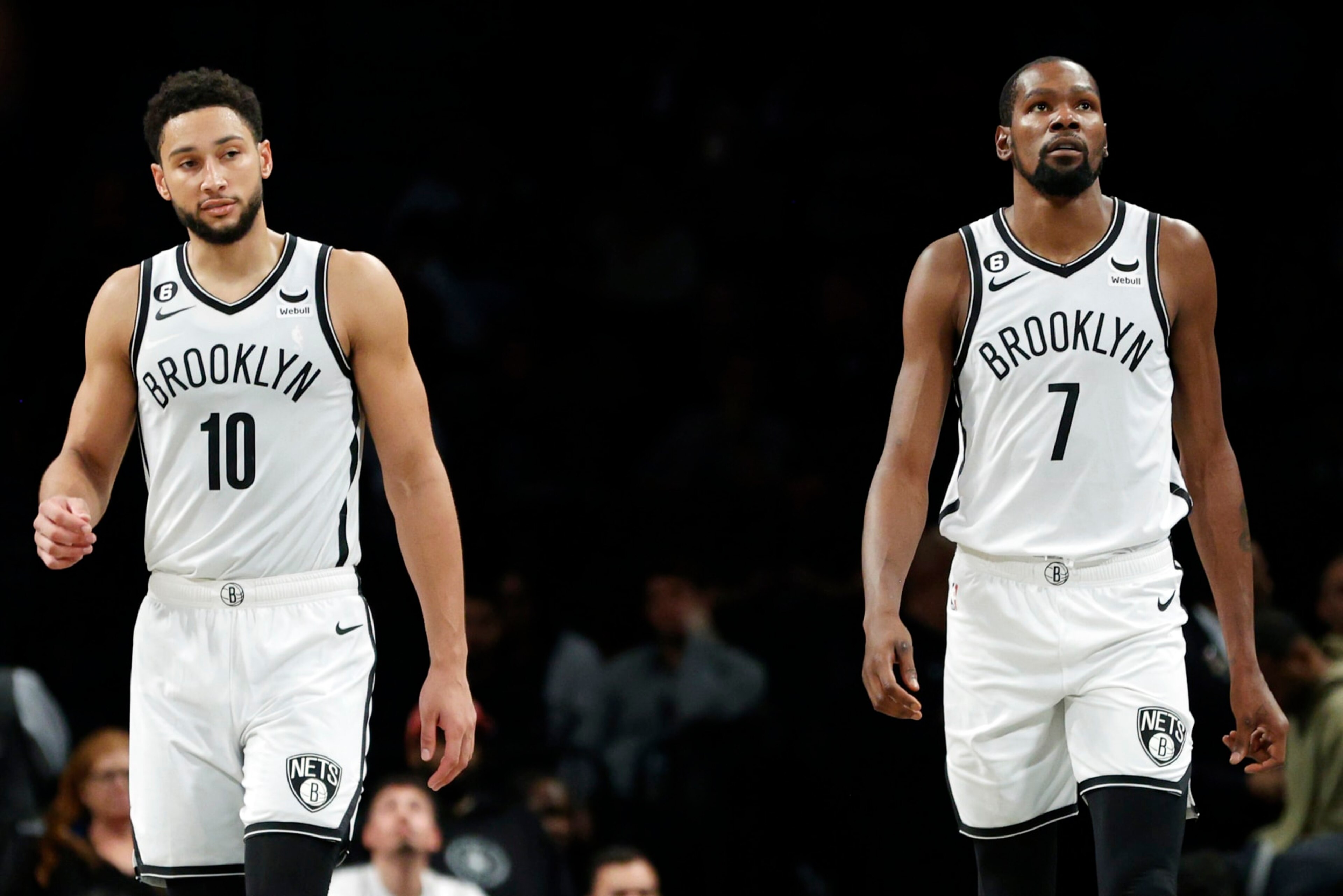 NEW YORK, NEW YORK - OCTOBER 06: Ben Simmons #10 and Kevin Durant #7 of the Brooklyn Nets look on during the second half against the Miami Heat at Barclays Center on October 06, 2022 in the Brooklyn borough of New York City. NOTE TO USER: User expressly acknowledges and agrees that, by downloading and or using this photograph, User is consenting to the terms and conditions of the Getty Images License Agreement. (Photo by Sarah Stier/Getty Images)