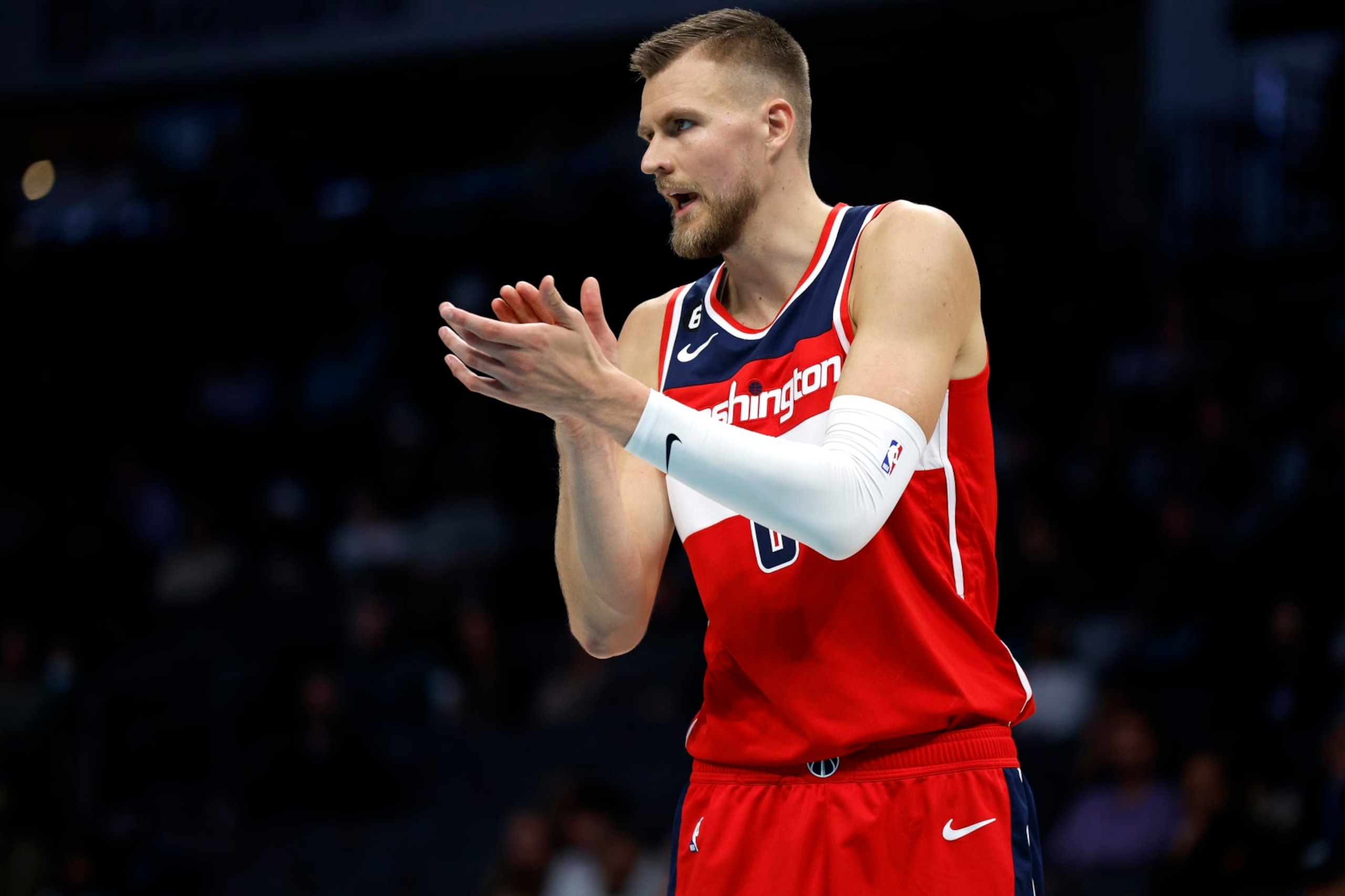 CHARLOTTE, NORTH CAROLINA - OCTOBER 10: Kristaps Porzingis #6 of the Washington Wizards reacts following a play during the second quarter of the game against the Charlotte Hornets at Spectrum Center on October 10, 2022 in Charlotte, North Carolina. NOTE TO USER: User expressly acknowledges and agrees that, by downloading and or using this photograph, User is consenting to the terms and conditions of the Getty Images License Agreement. (Photo by Jared C. Tilton/Getty Images) CHARLOTTE, NORTH CAROLINA - OCTOBER 10: Kristaps Porzingis #6 of the Washington Wizards reacts following a play during the second quarter of the game against the Charlotte Hornets at Spectrum Center on October 10, 2022 in Charlotte, North Carolina. NOTE TO USER: User expressly acknowledges and agrees that, by downloading and or using this photograph, User is consenting to the terms and conditions of the Getty Images License Agreement. (Photo by Jared C. Tilton/Getty Images)