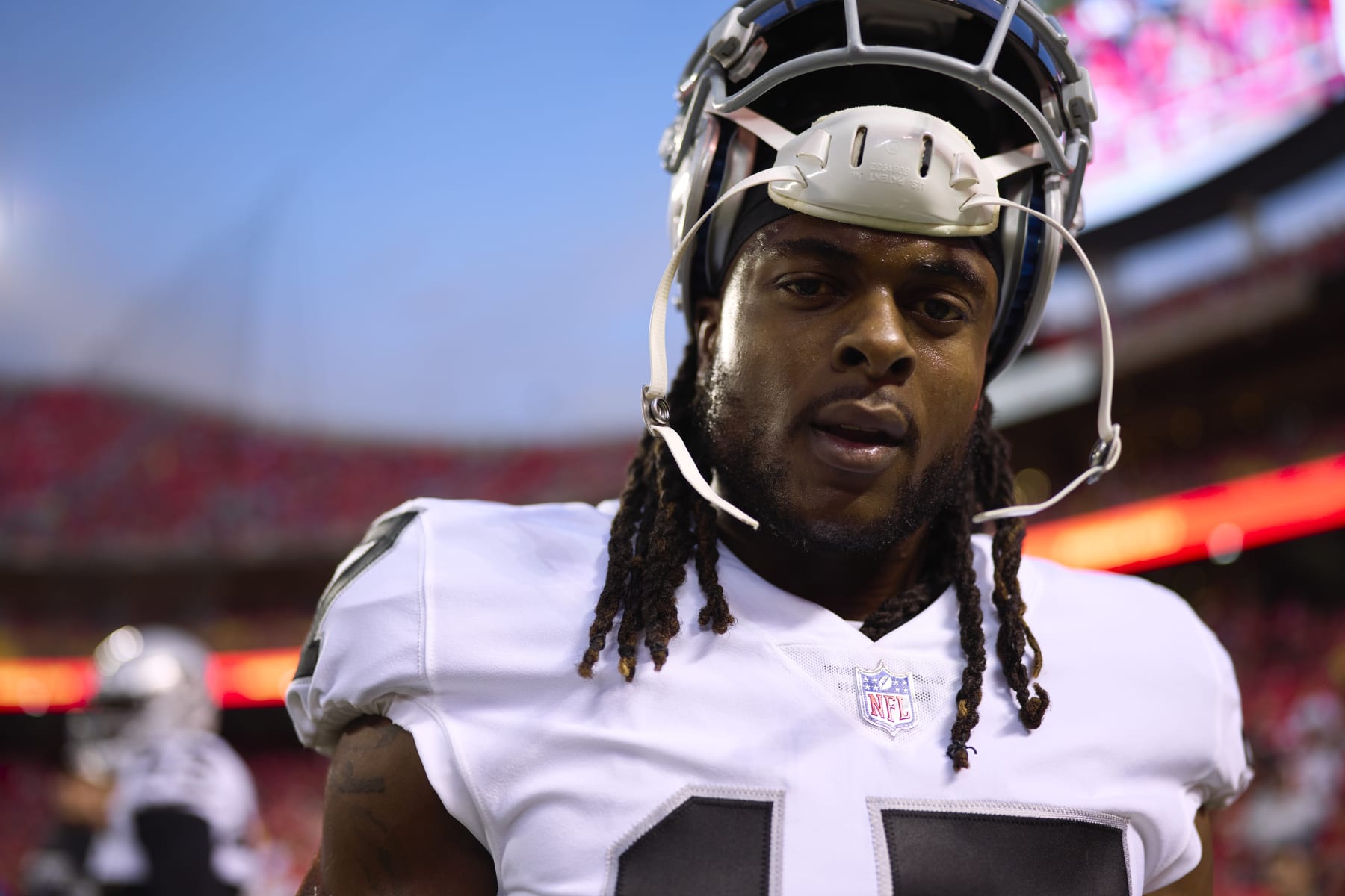 KANSAS CITY, MO - OCTOBER 10: Davante Adams #17 of the Las Vegas Raiders warms up before kickoff against the Kansas City Chiefs at GEHA Field at Arrowhead Stadium on October 10, 2022 in Kansas City, Missouri. (Photo by Cooper Neill/Getty Images)