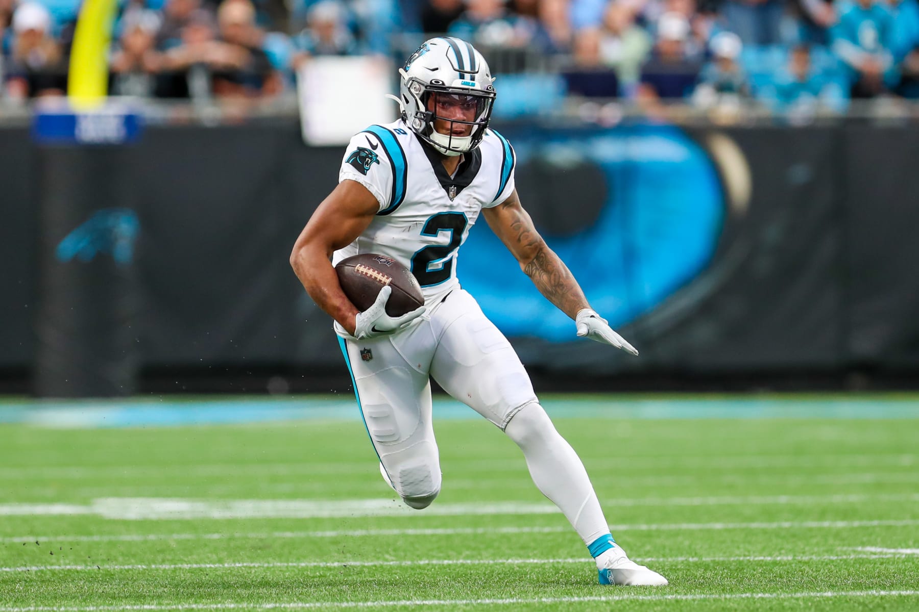 CHARLOTTE, NC - OCTOBER 02: DJ Moore (2) of the Carolina Panthers looks for room to run the ball after making a catch during a football game between the Carolina Panthers and the Arizona Cardinals on October 2, 2022, at Bank of America Stadium in Charlotte, NC. (Photo by David Jensen/Icon Sportswire via Getty Images)