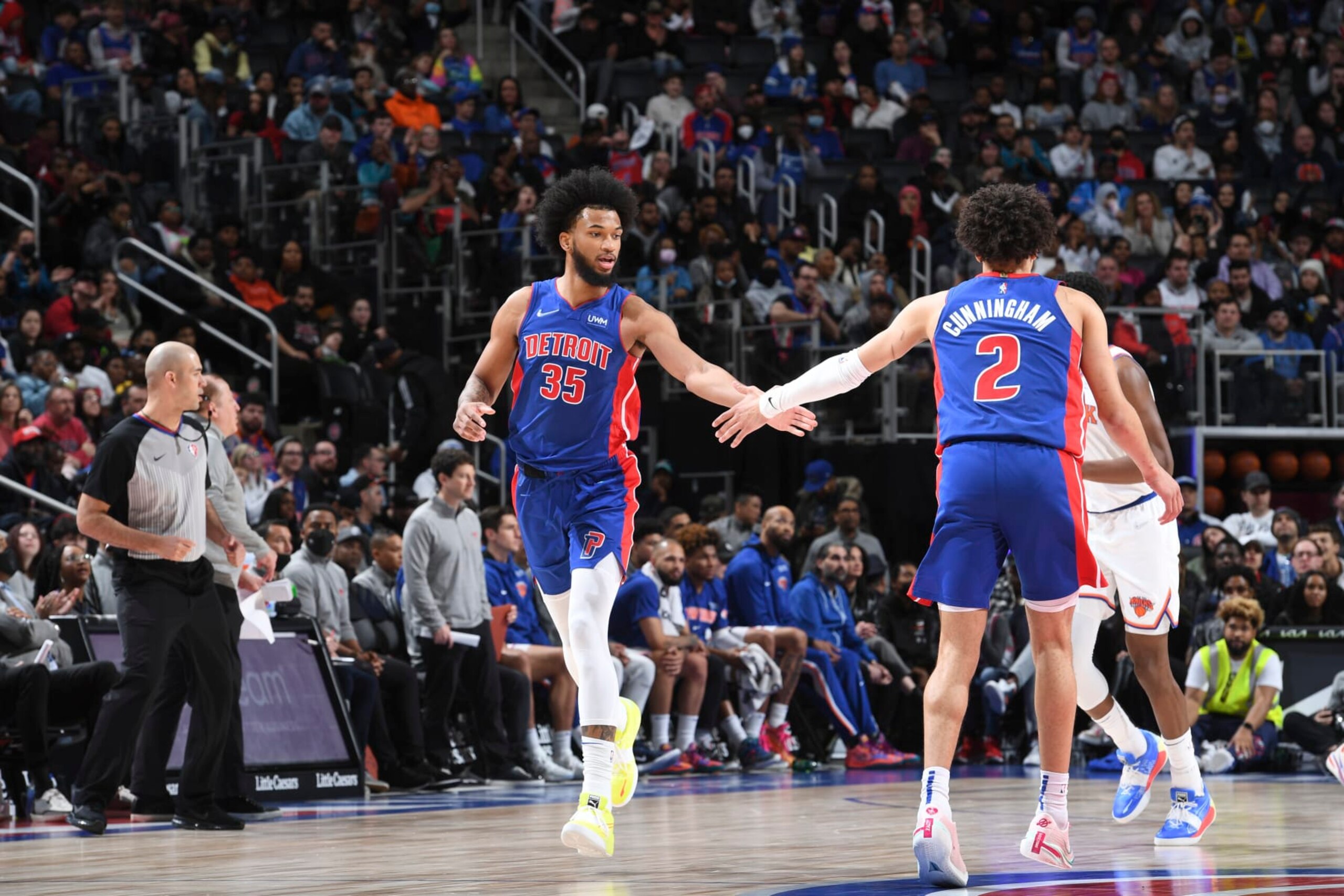 DETROIT, MI - MARCH 27: Marvin Bagley III #35 of the Detroit Pistons high fives Cade Cunningham #2 of the Detroit Pistons during the game against the New York Knicks on March 27, 2022 at Little Caesars Arena in Detroit, Michigan. NOTE TO USER: User expressly acknowledges and agrees that, by downloading and/or using this photograph, User is consenting to the terms and conditions of the Getty Images License Agreement. Mandatory Copyright Notice: Copyright 2022 NBAE (Photo by Chris Schwegler/NBAE via Getty Images)