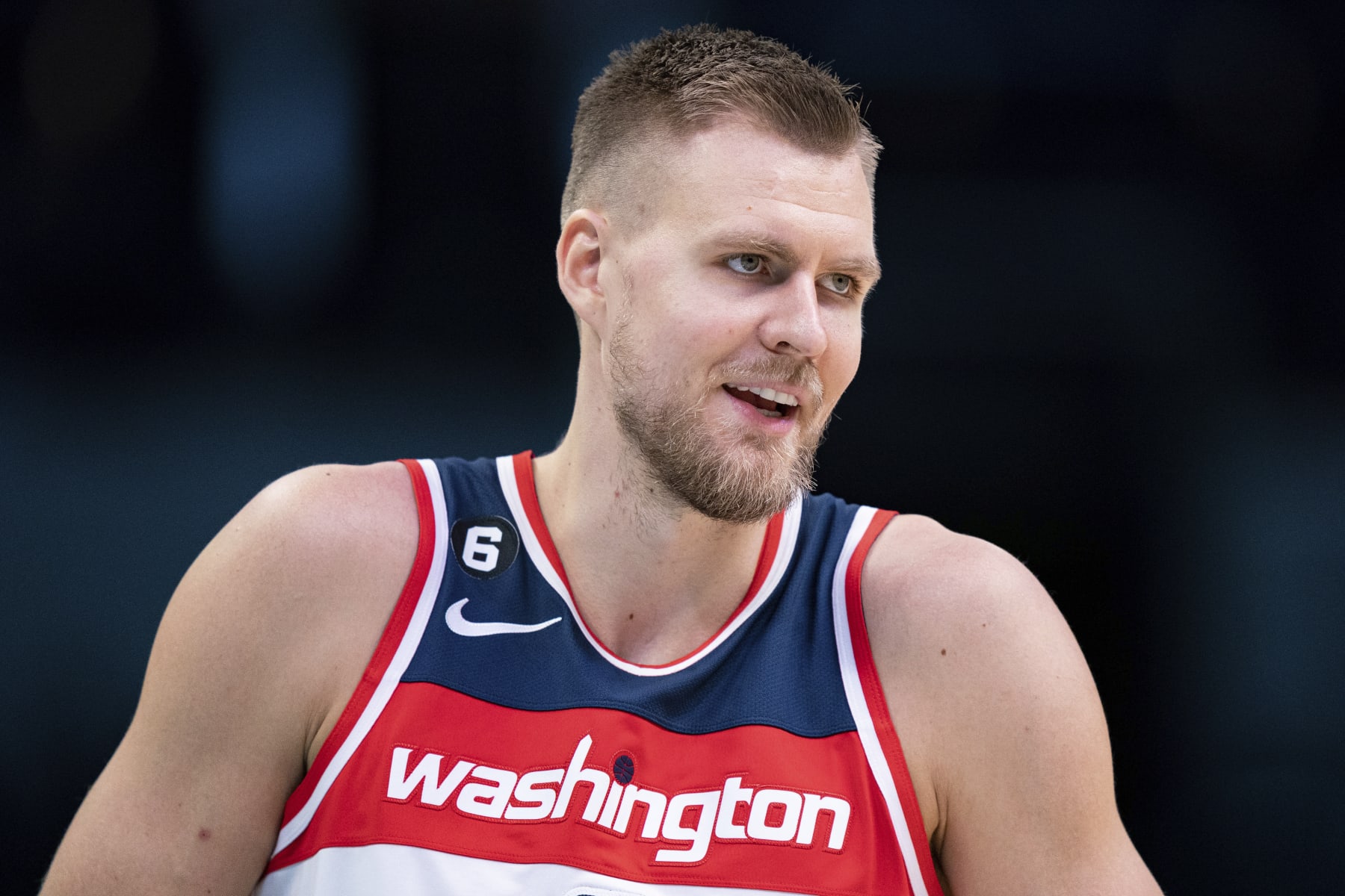 Washington Wizards center Kristaps Porzingis (6) looks on during an NBA preseason basketball game against the Charlotte Hornets in Charlotte, N.C., Monday, Oct. 10, 2022. (AP Photo/Jacob Kupferman)