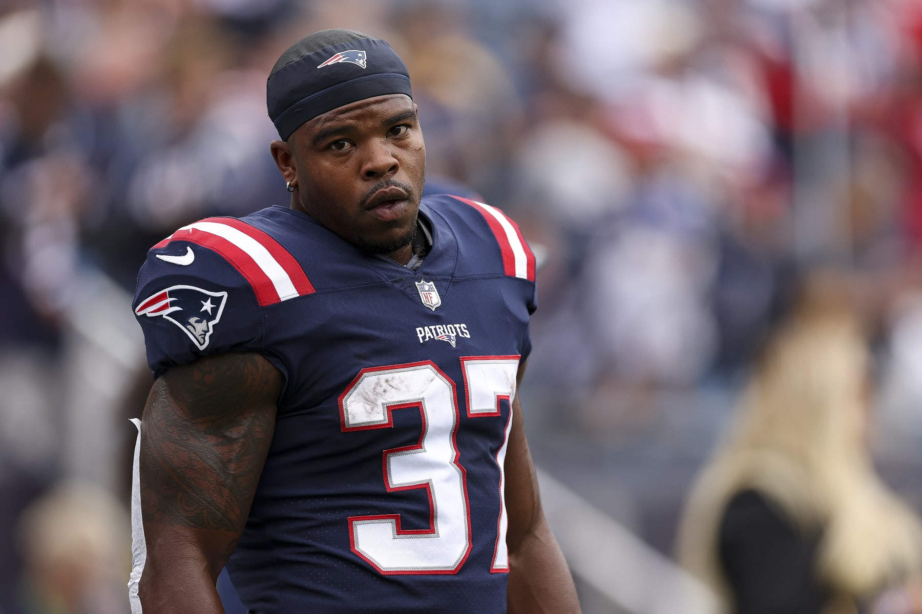 FOXBOROUGH, MASSACHUSETTS - SEPTEMBER 25: Running back Damien Harris #37 of the New England Patriots looks onward during pregame at Gillette Stadium on September 25, 2022 in Foxborough, Massachusetts. (Photo by Maddie Meyer/Getty Images)
