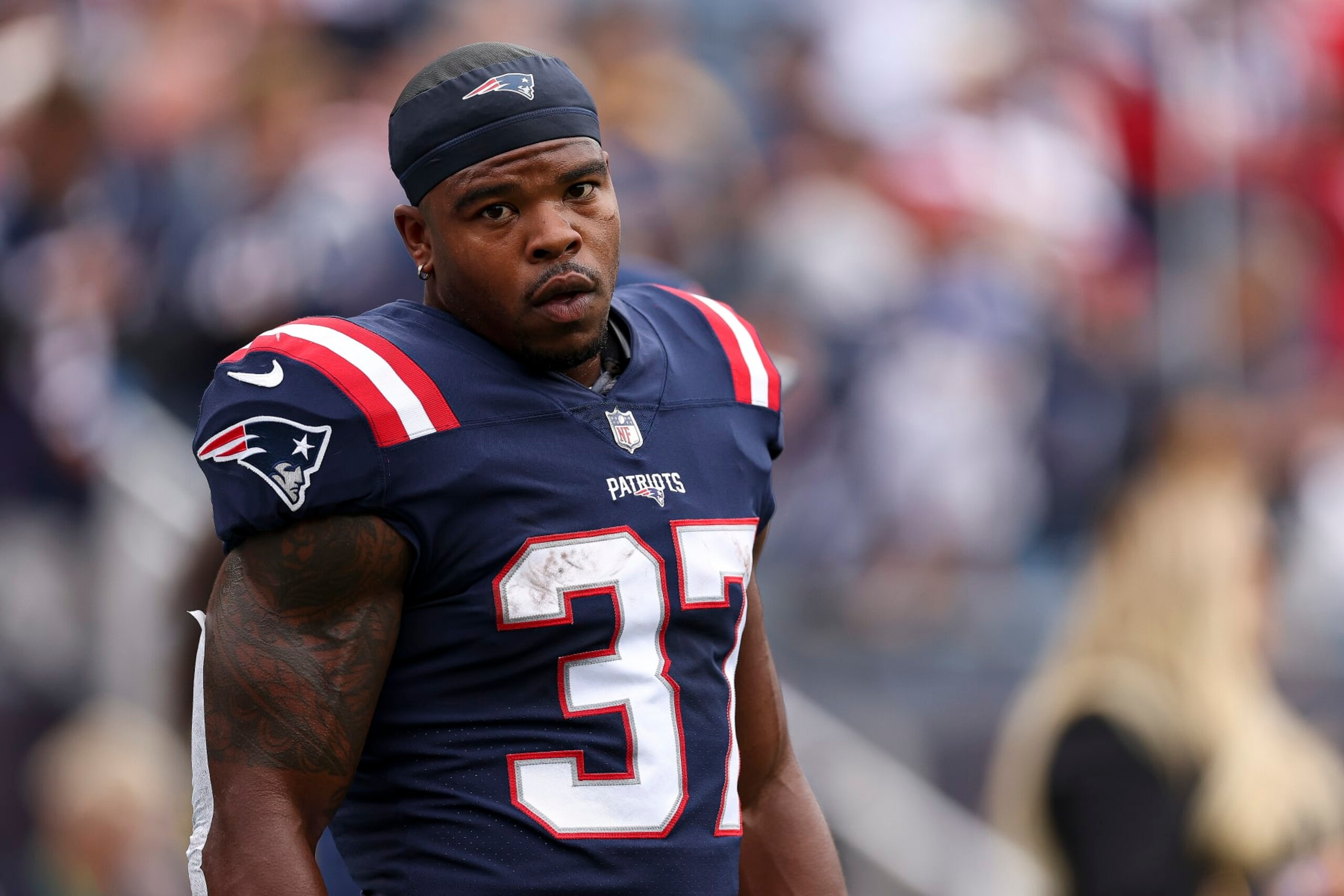 FOXBOROUGH, MASSACHUSETTS - SEPTEMBER 25: Running back Damien Harris #37 of the New England Patriots looks onward during pregame at Gillette Stadium on September 25, 2022 in Foxborough, Massachusetts. (Photo by Maddie Meyer/Getty Images)