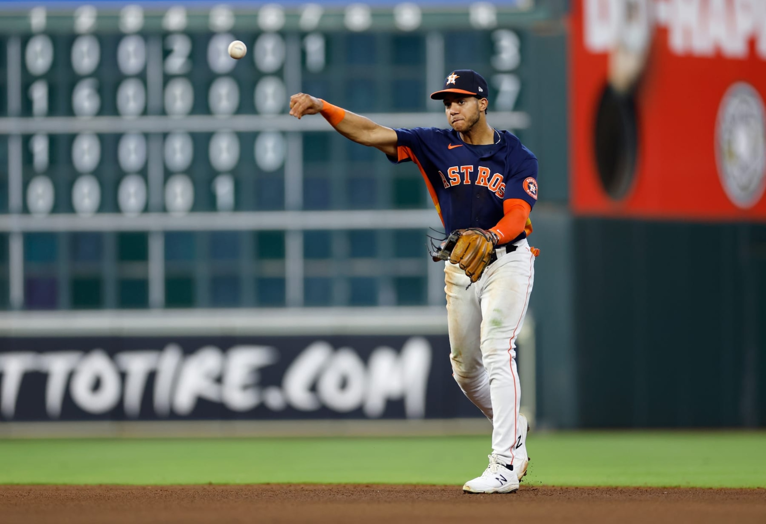 HOUSTON, TEXAS - OCTOBER 02: Jeremy Pena #3 of the Houston Astros throws to first for an out in the sixth inning against the Tampa Bay Rays at Minute Maid Park on October 02, 2022 in Houston, Texas. (Photo by Tim Warner/Getty Images)