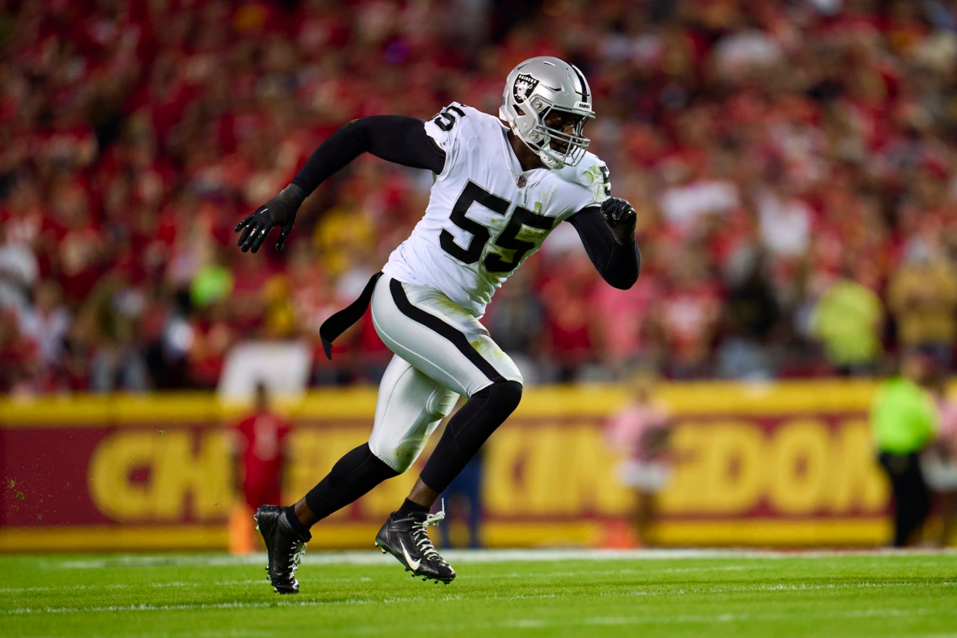 KANSAS CITY, MO - OCTOBER 10: Chandler Jones #55 of the Las Vegas Raiders rushes the passer against the Kansas City Chiefs during the first half at GEHA Field at Arrowhead Stadium on October 10, 2022 in Kansas City, Missouri. (Photo by Cooper Neill/Getty Images)
