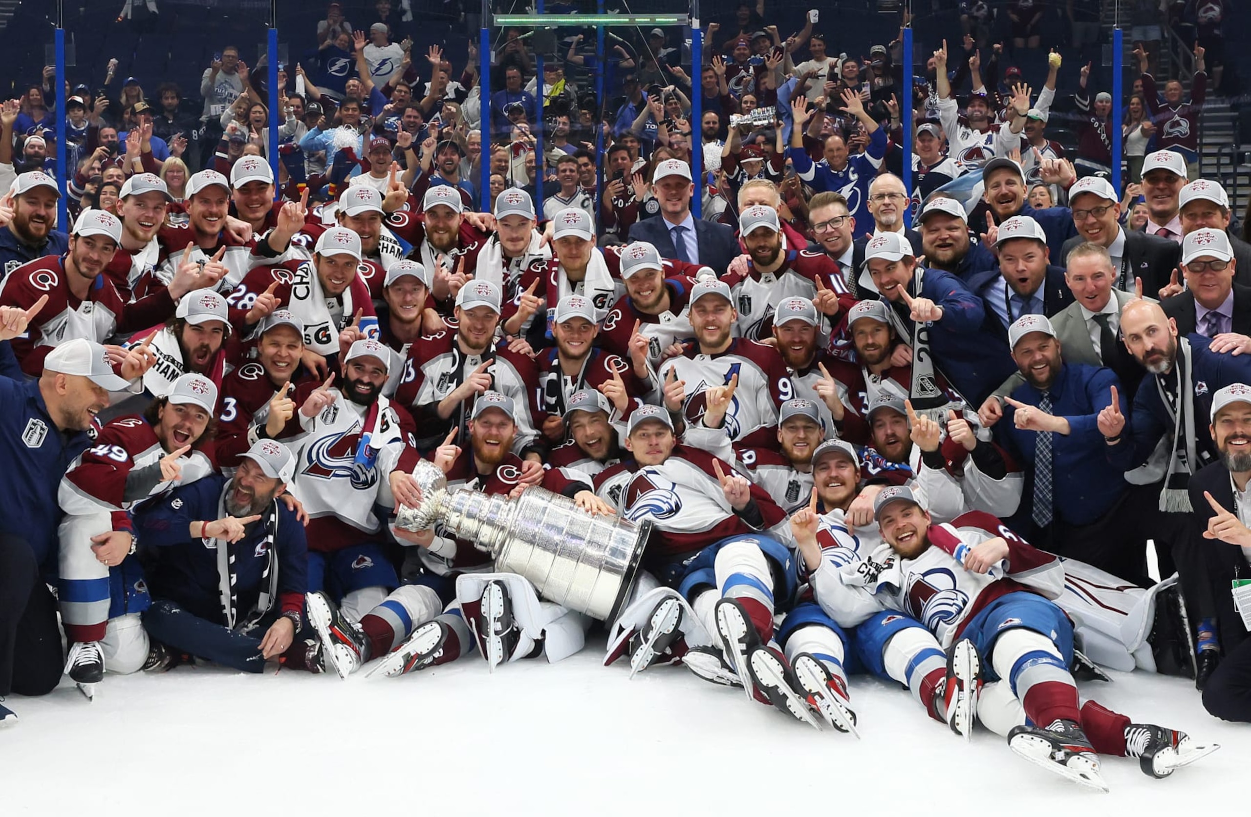 TAMPA, FLORIDA - JUNE 26: Colorado Avalanche coaches and players pose for a photo after defeating the Tampa Bay Lightning 2-1 in Game Six of the 2022 NHL Stanley Cup Final at Amalie Arena on June 26, 2022 in Tampa, Florida. (Photo by Bruce Bennett/Getty Images) TAMPA, FLORIDA - JUNE 26: Colorado Avalanche coaches and players pose for a photo after defeating the Tampa Bay Lightning 2-1 in Game Six of the 2022 NHL Stanley Cup Final at Amalie Arena on June 26, 2022 in Tampa, Florida. (Photo by Bruce Bennett/Getty Images)