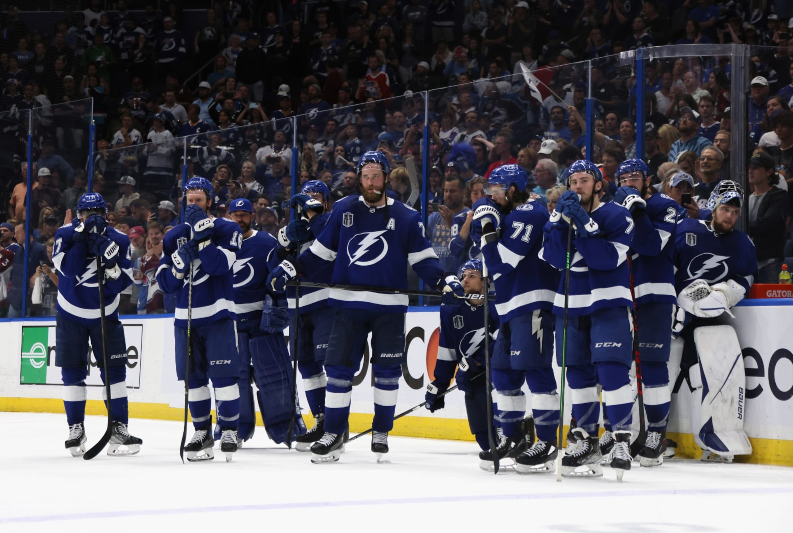 TAMPA, FLORIDA - JUNE 26: The Tampa Bay Lightning watch the Colorado Avalanche celebrate their Stanley Cup win following Game Six of the 2022 NHL Stanley Cup Final at Amalie Arena on June 26, 2022 in Tampa, Florida. (Photo by Bruce Bennett/Getty Images) TAMPA, FLORIDA - JUNE 26: The Tampa Bay Lightning watch the Colorado Avalanche celebrate their Stanley Cup win following Game Six of the 2022 NHL Stanley Cup Final at Amalie Arena on June 26, 2022 in Tampa, Florida. (Photo by Bruce Bennett/Getty Images)