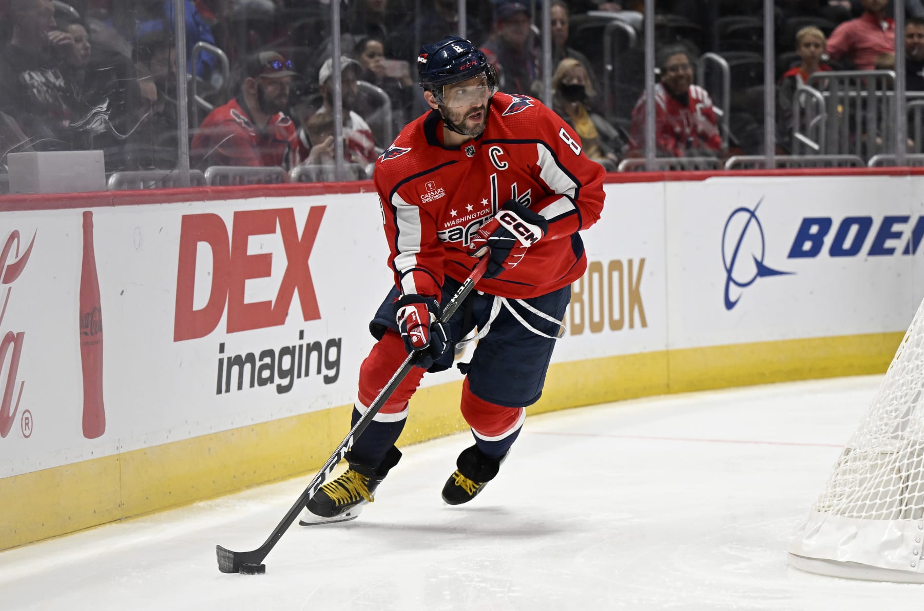 WASHINGTON, DC - OCTOBER 08: Alex Ovechkin #8 of the Washington Capitals handles the puck against the Columbus Blue Jackets during a preseason game at Capital One Arena on October 08, 2022 in Washington, DC. (Photo by G Fiume/Getty Images)