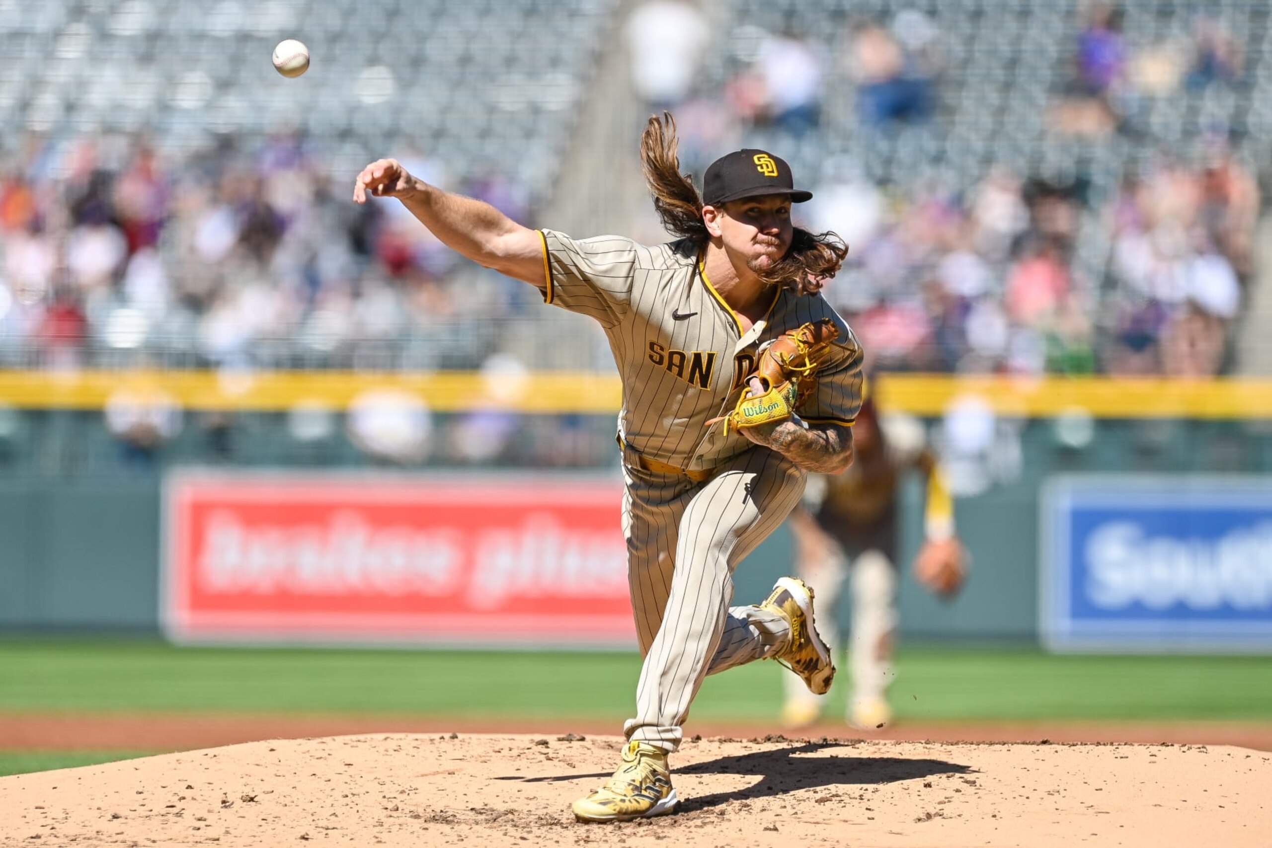 DENVER, CO - SEPTEMBER 25: Mike Clevinger #52 of the San Diego Padres pitches against the Colorado Rockies in the first inning of a game at Coors Field on September 25, 2022 in Denver, Colorado. (Photo by Dustin Bradford/Getty Images)