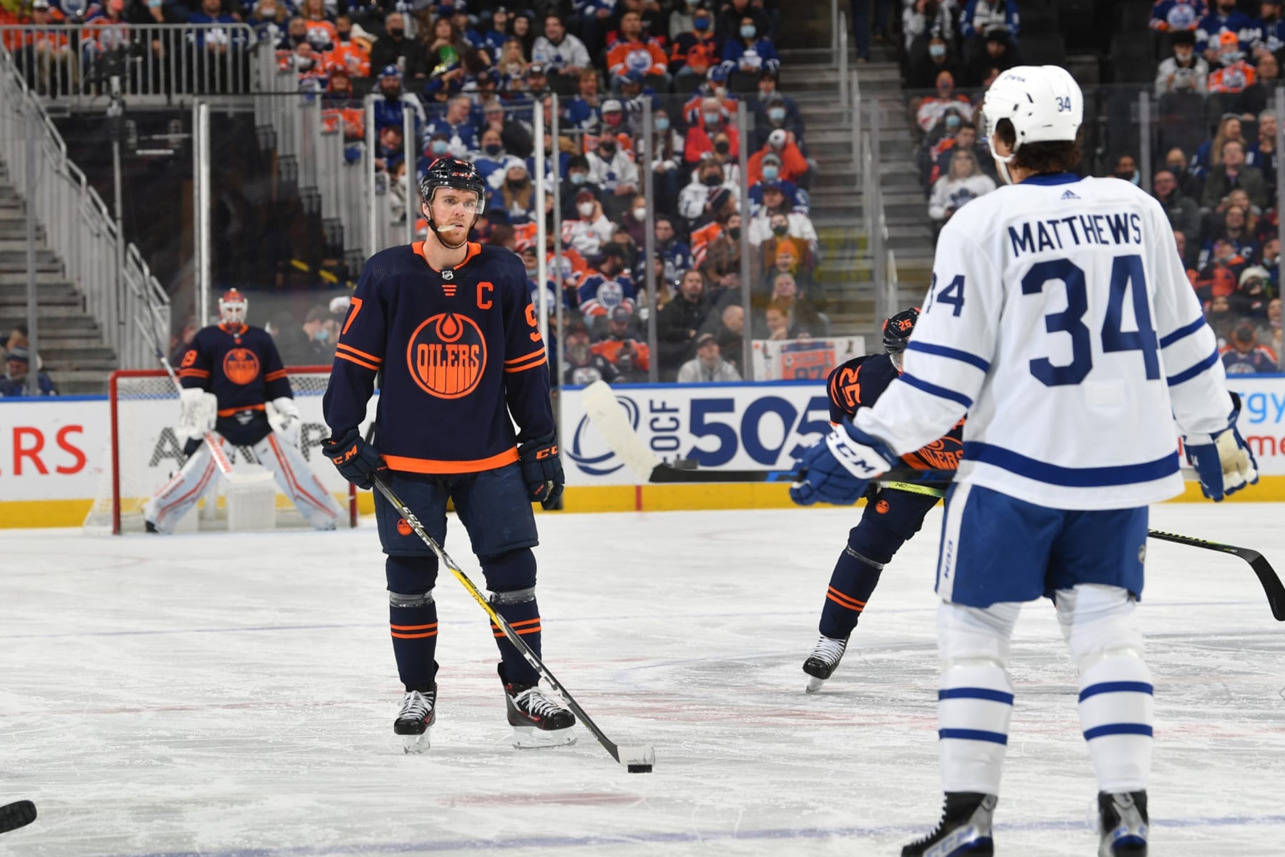 EDMONTON, AB - DECEMBER 14: Connor McDavid #97 of the Edmonton Oilers lines up for a face off against Auston Matthews #34 of the Toronto Maple Leafs on December 14, 2021 at Rogers Place in Edmonton, Alberta, Canada. (Photo by Andy Devlin/NHLI via Getty Images) EDMONTON, AB - DECEMBER 14: Connor McDavid #97 of the Edmonton Oilers lines up for a face off against Auston Matthews #34 of the Toronto Maple Leafs on December 14, 2021 at Rogers Place in Edmonton, Alberta, Canada. (Photo by Andy Devlin/NHLI via Getty Images)