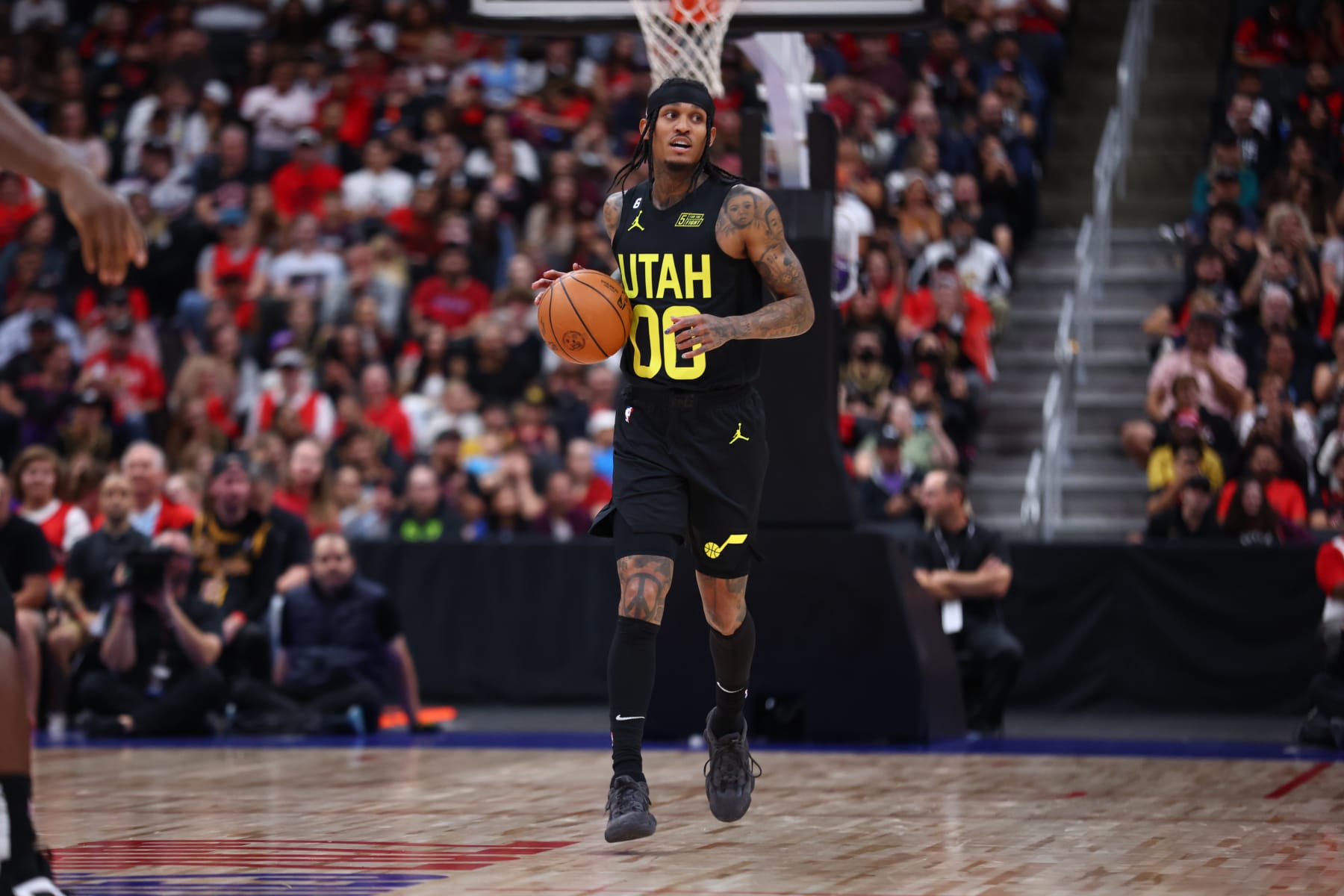 ALBERTA, CANADA - OCTOBER 2: Jordan Clarkson #00 of the Utah Jazz dribbles the ball against the Toronto Raptors during a preseason game on October 2, 2022 at the Rogers Place in Edmonton, Alberta, Canada.  NOTE TO USER: User expressly acknowledges and agrees that, by downloading and or using this Photograph, user is consenting to the terms and conditions of the Getty Images License Agreement.  Mandatory Copyright Notice: Copyright 2022 NBAE (Photo by Vaughn Ridley/NBAE via Getty Images)
