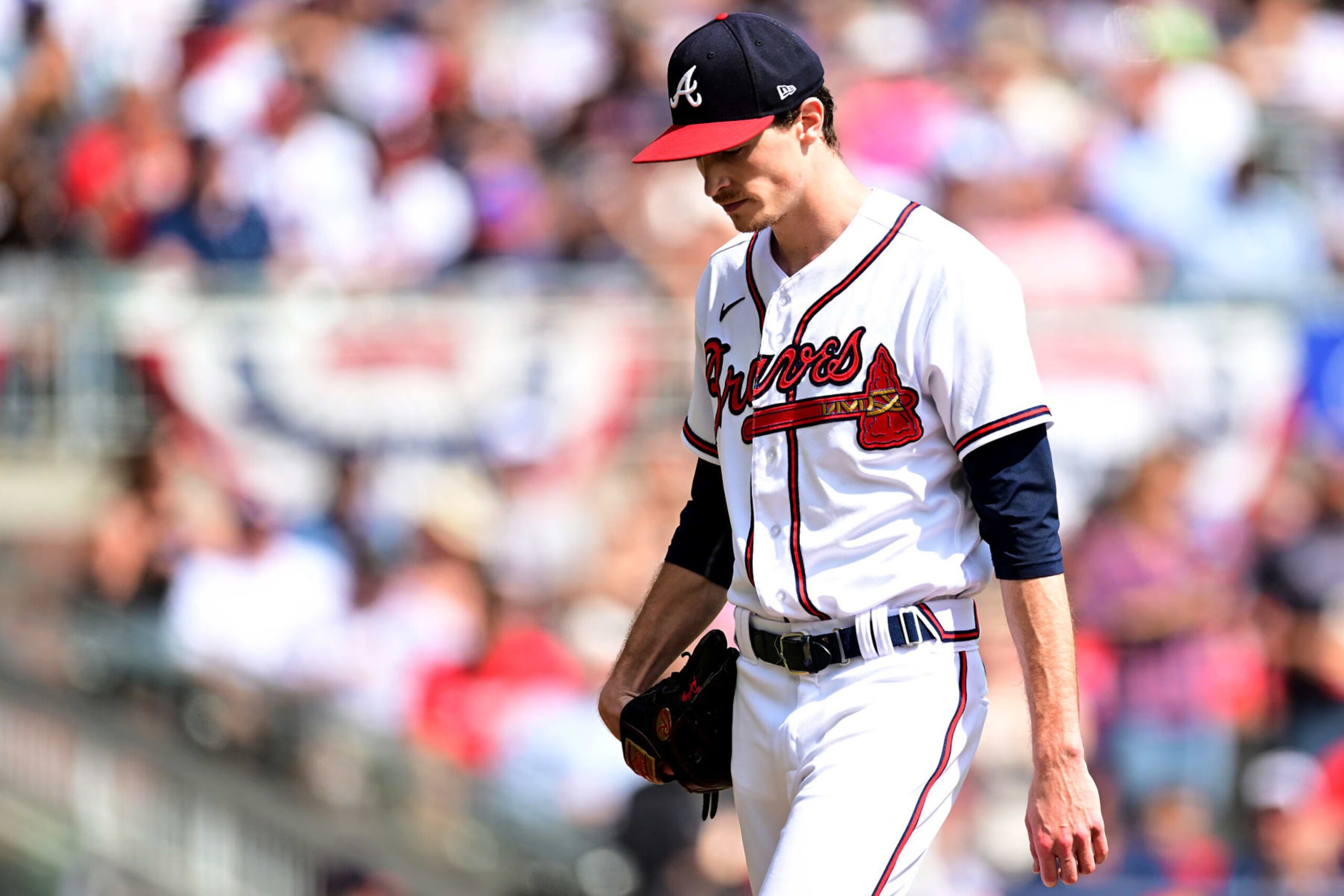ATLANTA, GEORGIA - OCTOBER 11: Max Fried #54 of the Atlanta Braves walks off the field after the first inning against the Philadelphia Phillies in game one of the National League Division Series at Truist Park on October 11, 2022 in Atlanta, Georgia. (Photo by Adam Hagy/Getty Images)