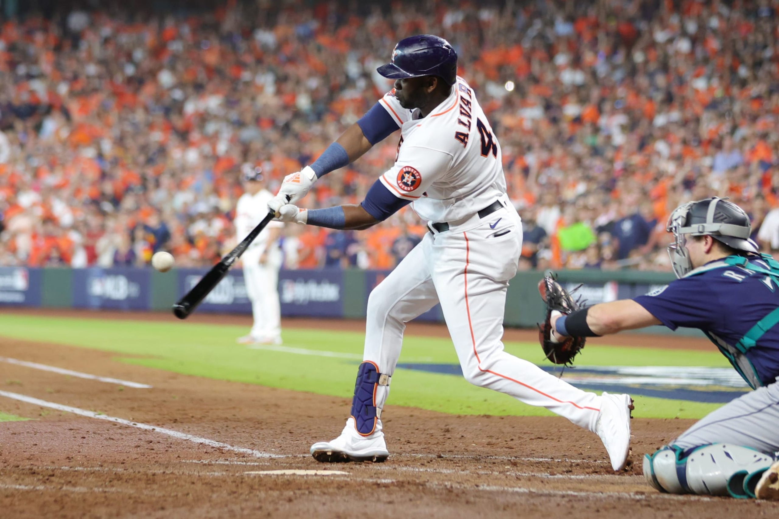 HOUSTON, TEXAS - OCTOBER 11: Yordan Alvarez #44 of the Houston Astros hits a two-run double against the Seattle Mariners during the third inning in game one of the American League Division Series at Minute Maid Park on October 11, 2022 in Houston, Texas. (Photo by Carmen Mandato/Getty Images)