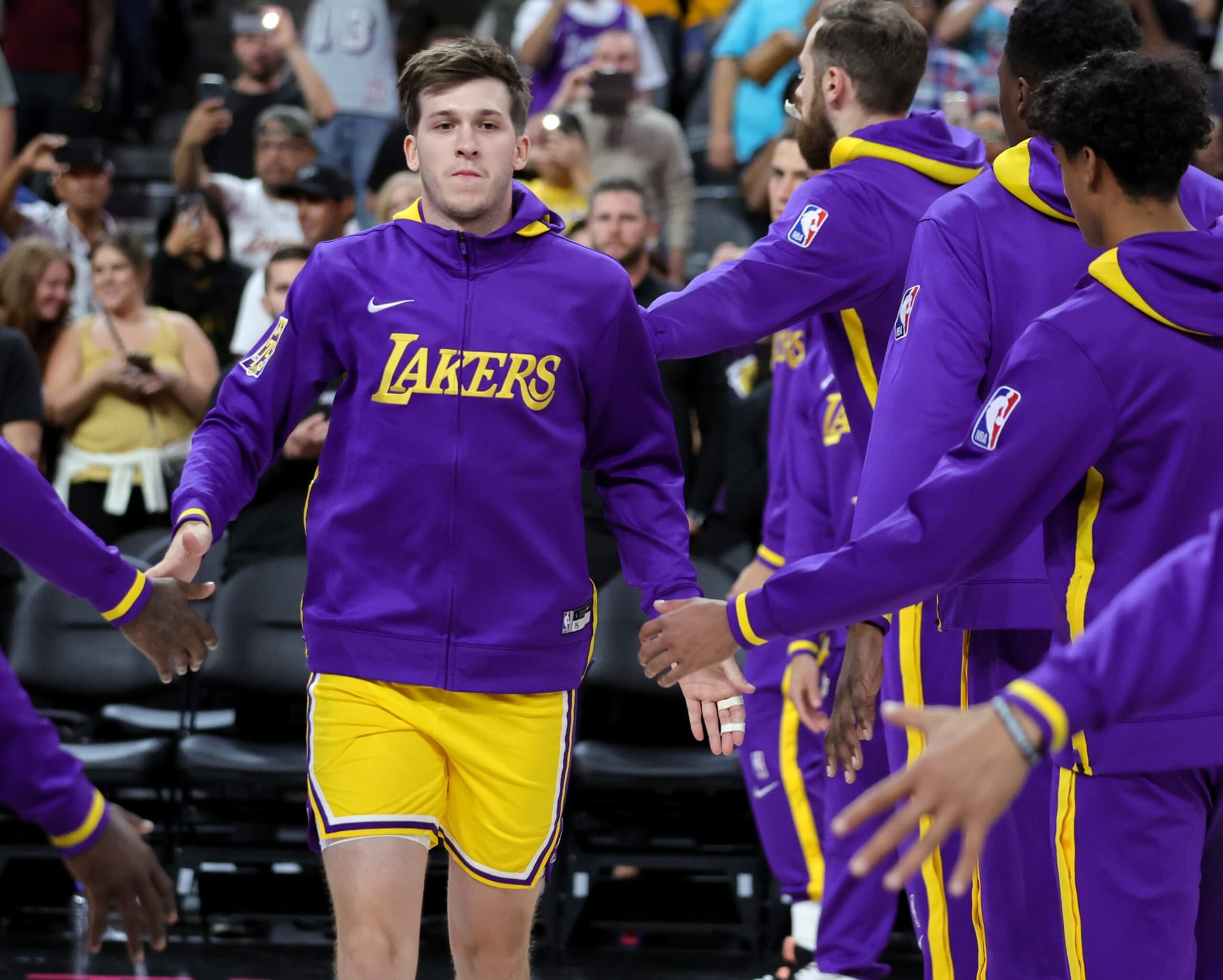 LAS VEGAS, NEVADA - OCTOBER 05: Austin Reaves #15 of the Los Angeles Lakers is introduced before a preseason game against the Phoenix Suns at T-Mobile Arena on October 05, 2022 in Las Vegas, Nevada. The Suns defeated the Lakers 119-115. NOTE TO USER: User expressly acknowledges and agrees that, by downloading and or using this photograph, User is consenting to the terms and conditions of the Getty Images License Agreement. (Photo by Ethan Miller/Getty Images) LAS VEGAS, NEVADA - OCTOBER 05: Austin Reaves #15 of the Los Angeles Lakers is introduced before a preseason game against the Phoenix Suns at T-Mobile Arena on October 05, 2022 in Las Vegas, Nevada. The Suns defeated the Lakers 119-115. NOTE TO USER: User expressly acknowledges and agrees that, by downloading and or using this photograph, User is consenting to the terms and conditions of the Getty Images License Agreement. (Photo by Ethan Miller/Getty Images)