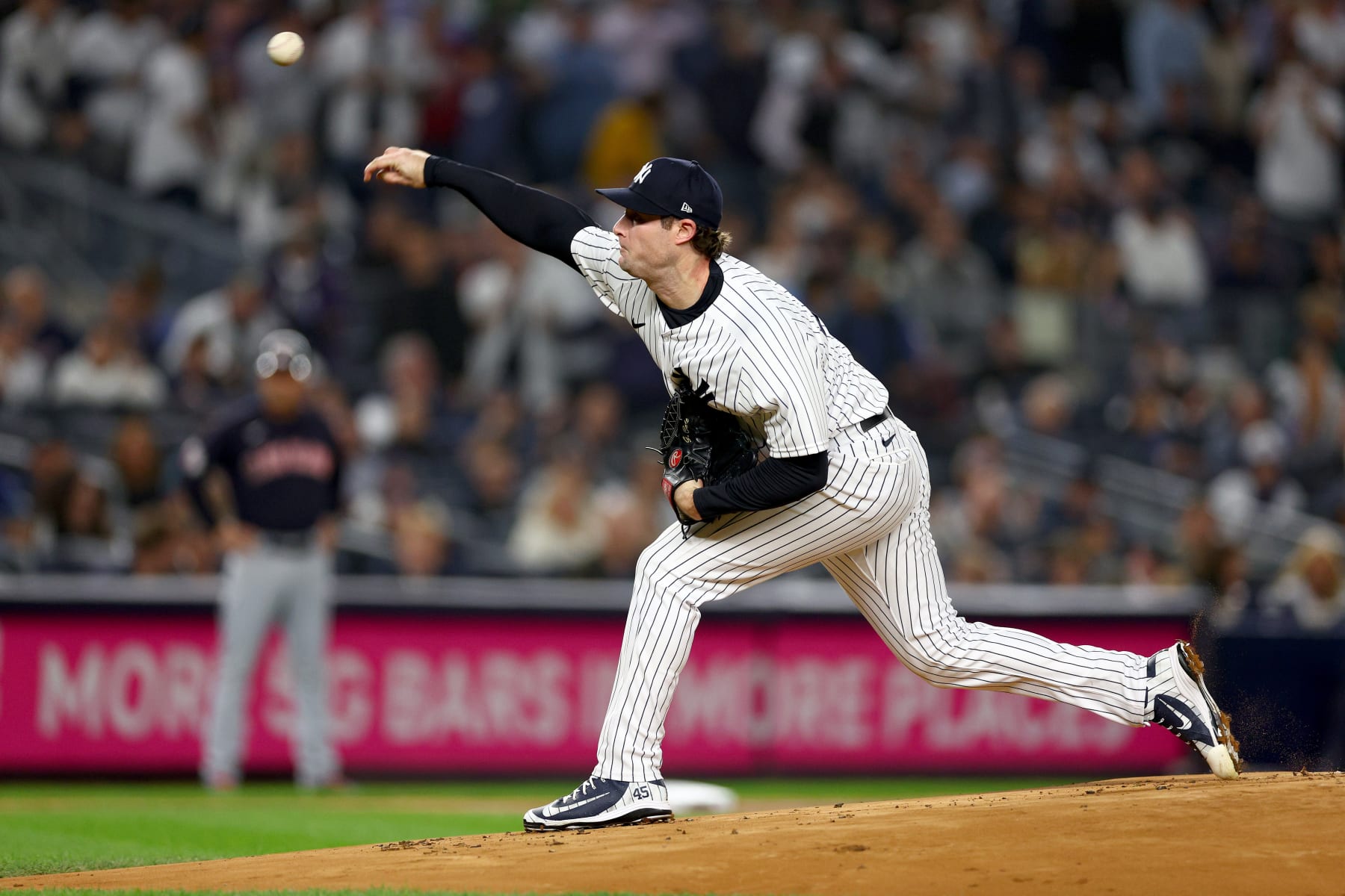 NEW YORK, NEW YORK - OCTOBER 11: Gerrit Cole #45 of the New York Yankees throws a pitch against the Cleveland Guardians during the first inning in game one of the American League Division Series at Yankee Stadium on October 11, 2022 in New York, New York. (Photo by Elsa/Getty Images)