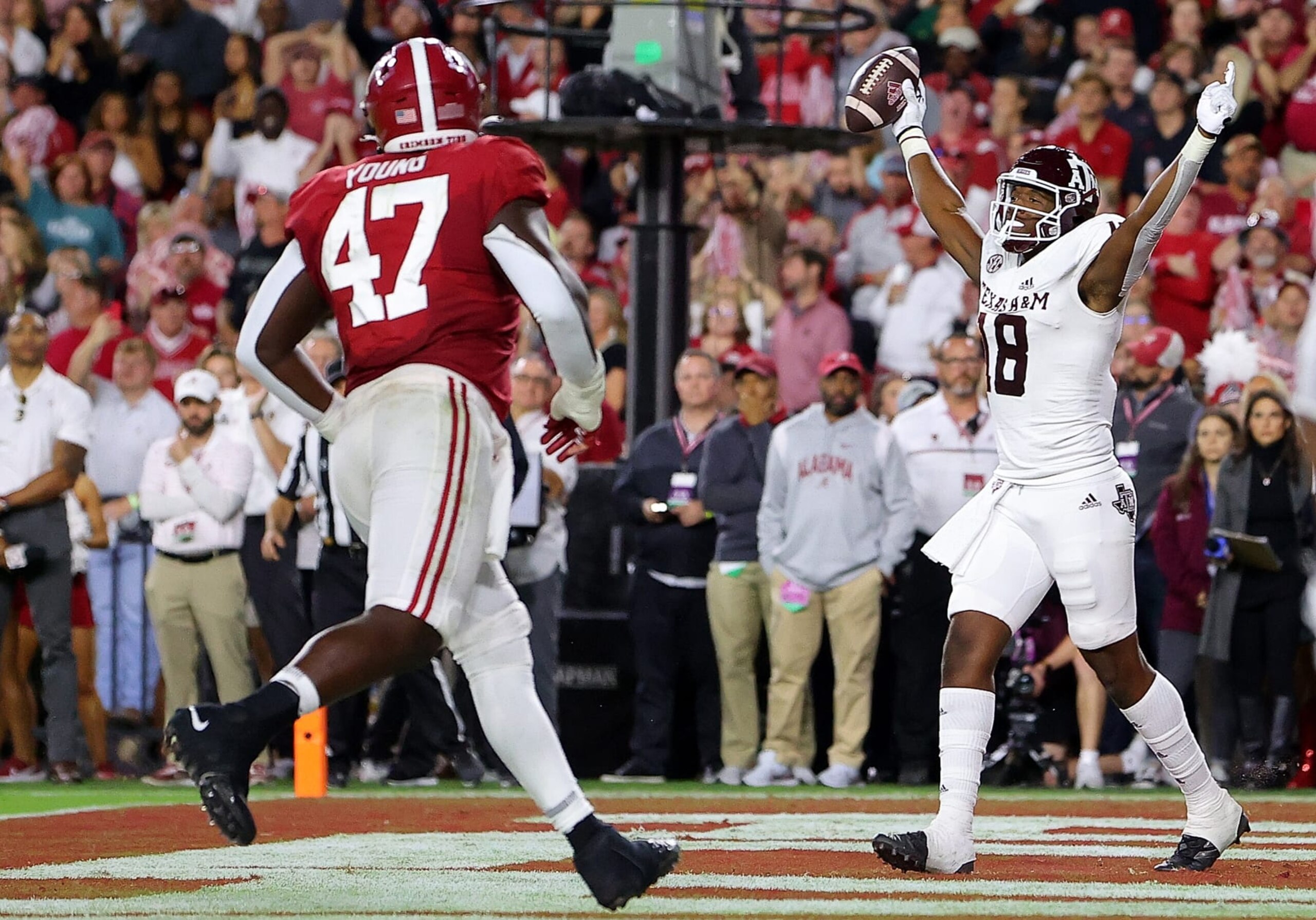 TUSCALOOSA, ALABAMA - OCTOBER 08:  Donovan Green #18 of the Texas A&M Aggies reacts after pulling in this touchdown reception against the Alabama Crimson Tide during the first half at Bryant-Denny Stadium on October 08, 2022 in Tuscaloosa, Alabama. (Photo by Kevin C. Cox/Getty Images)
