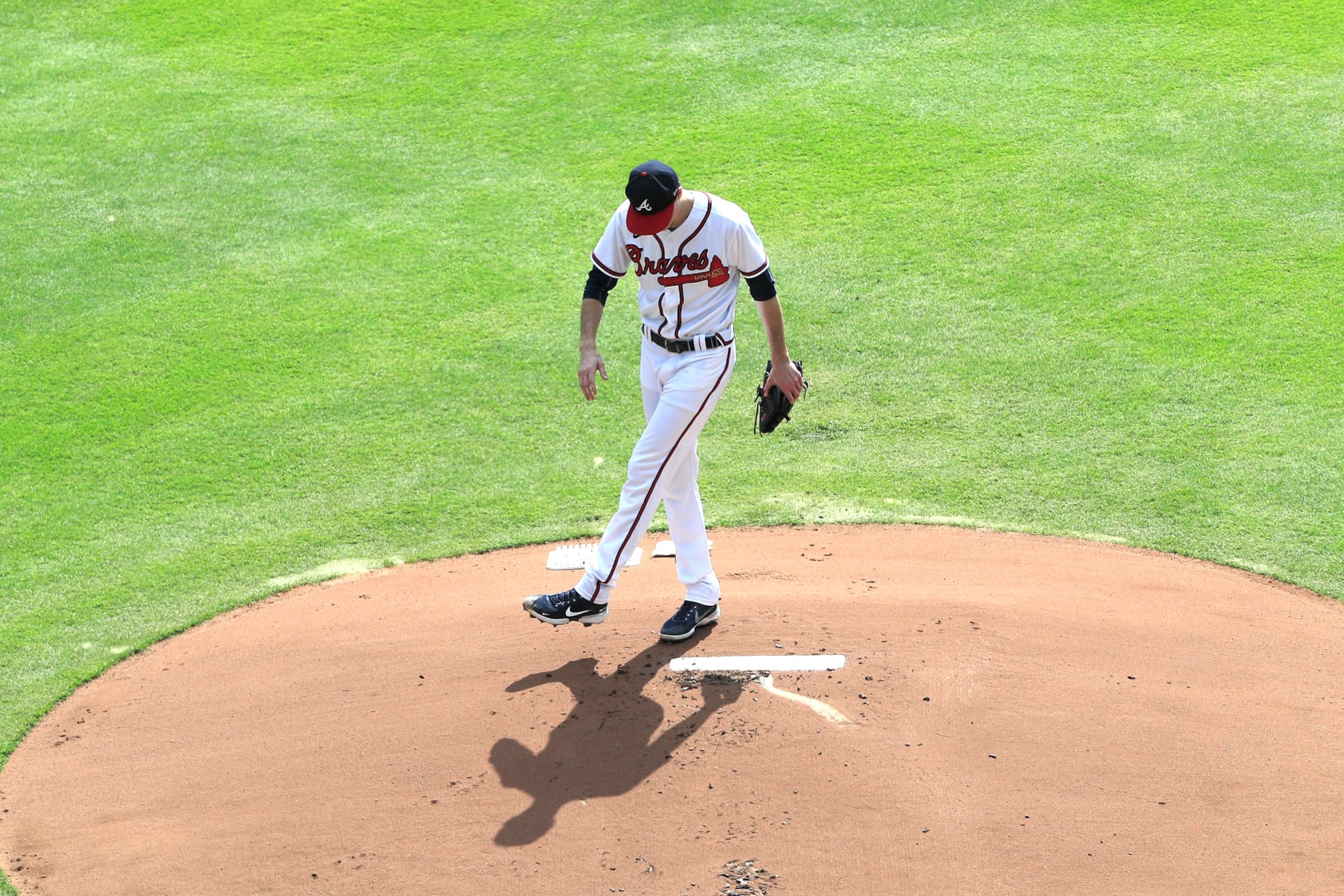 ATLANTA, GA - OCTOBER 11: Atlanta Braves starting pitcher Max Fried (54) kicks some dirt on the mound during Game 1 of the NLDS between the Atlanta Braves and the Philadephia Phillies on October 11, 2022 at Truist Park in Atlanta, Georgia.  (Photo by David J. Griffin/Icon Sportswire via Getty Images)