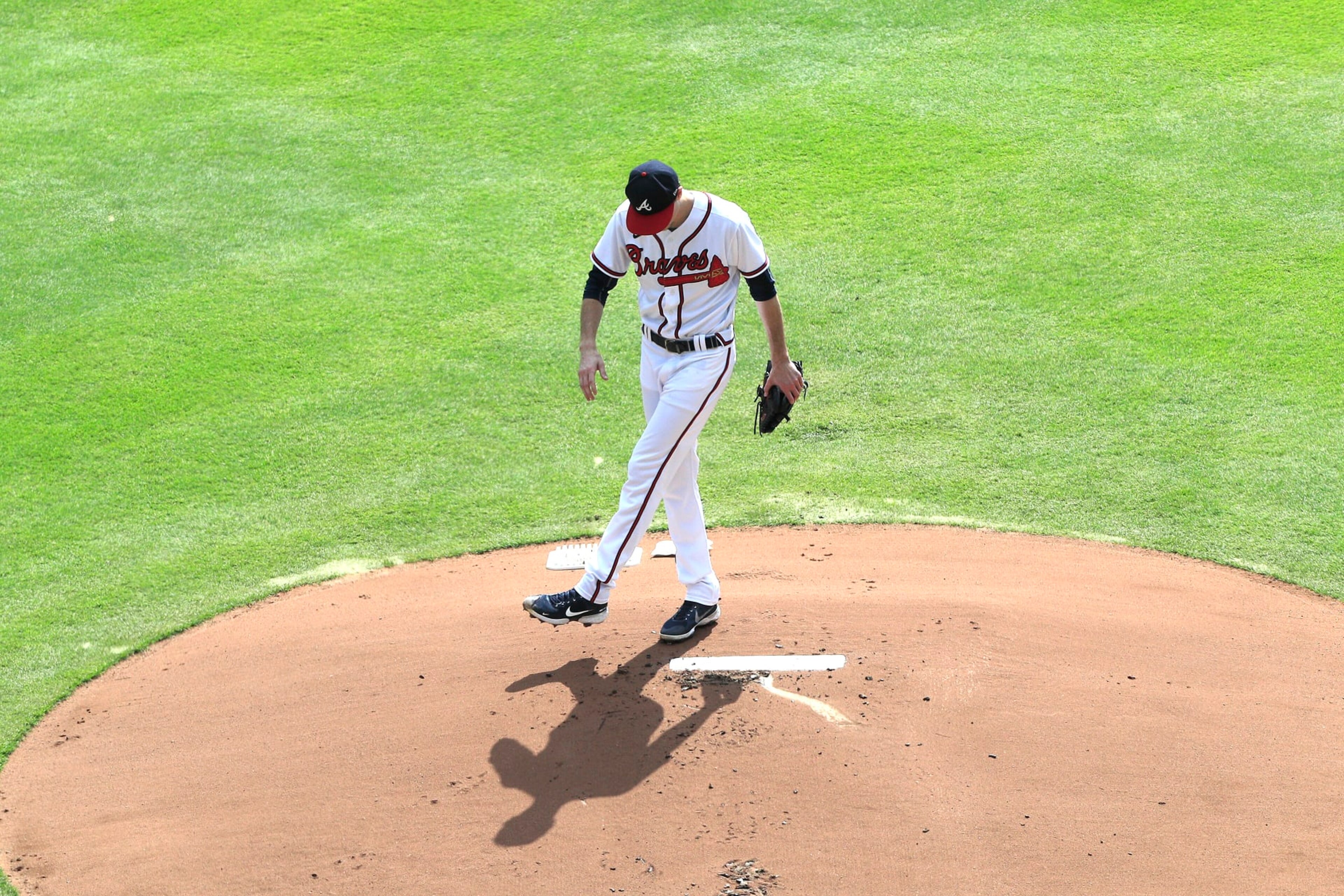 ATLANTA, GA - OCTOBER 11: Atlanta Braves starting pitcher Max Fried (54) kicks some dirt on the mound during Game 1 of the NLDS between the Atlanta Braves and the Philadephia Phillies on October 11, 2022 at Truist Park in Atlanta, Georgia.  (Photo by David J. Griffin/Icon Sportswire via Getty Images)