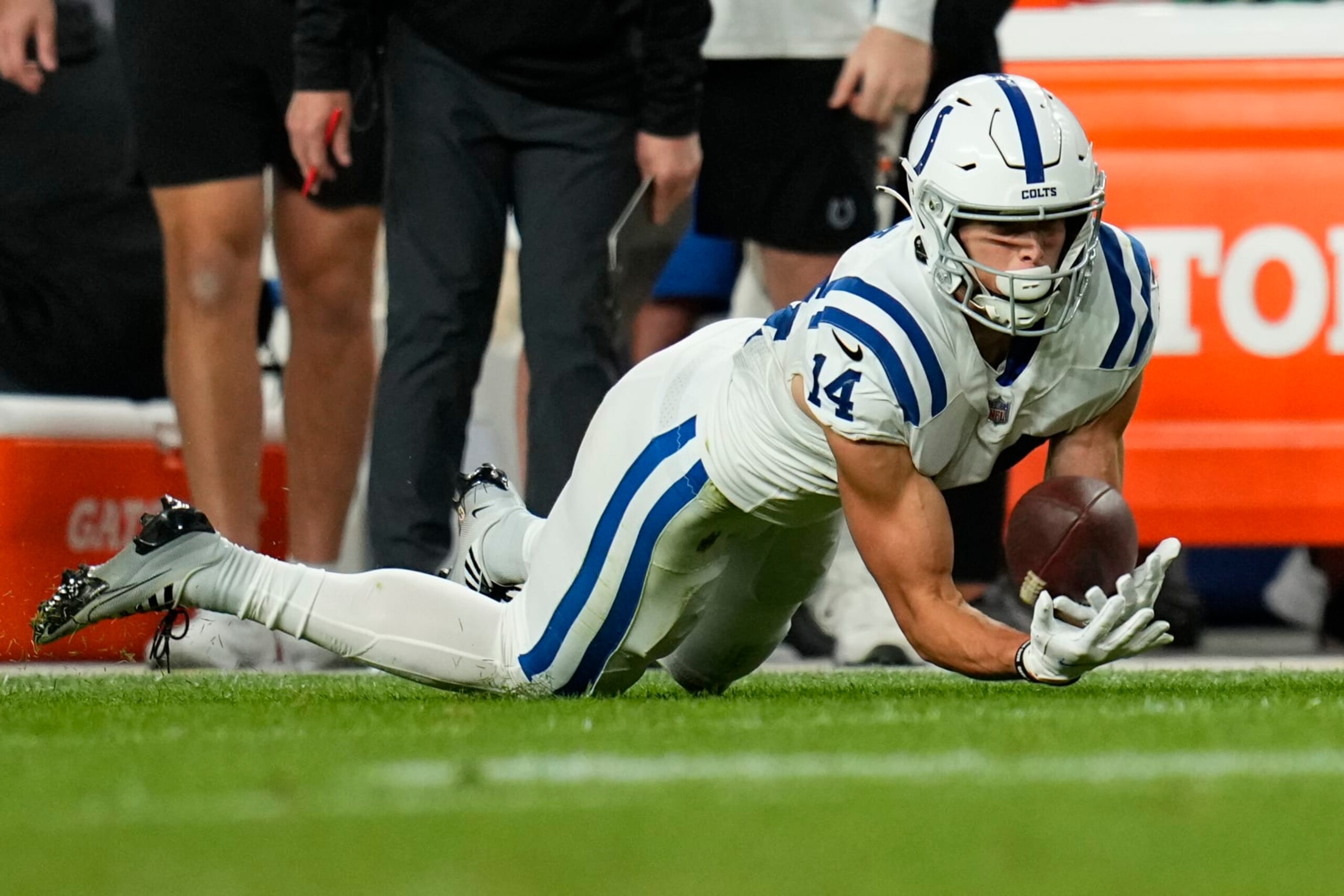 Indianapolis Colts wide receiver Alec Pierce (14) catches a pass against the Denver Broncos during an NFL football game, Thursday, Oct. 7, 2022, in Denver. (AP Photo/Jack Dempsey)