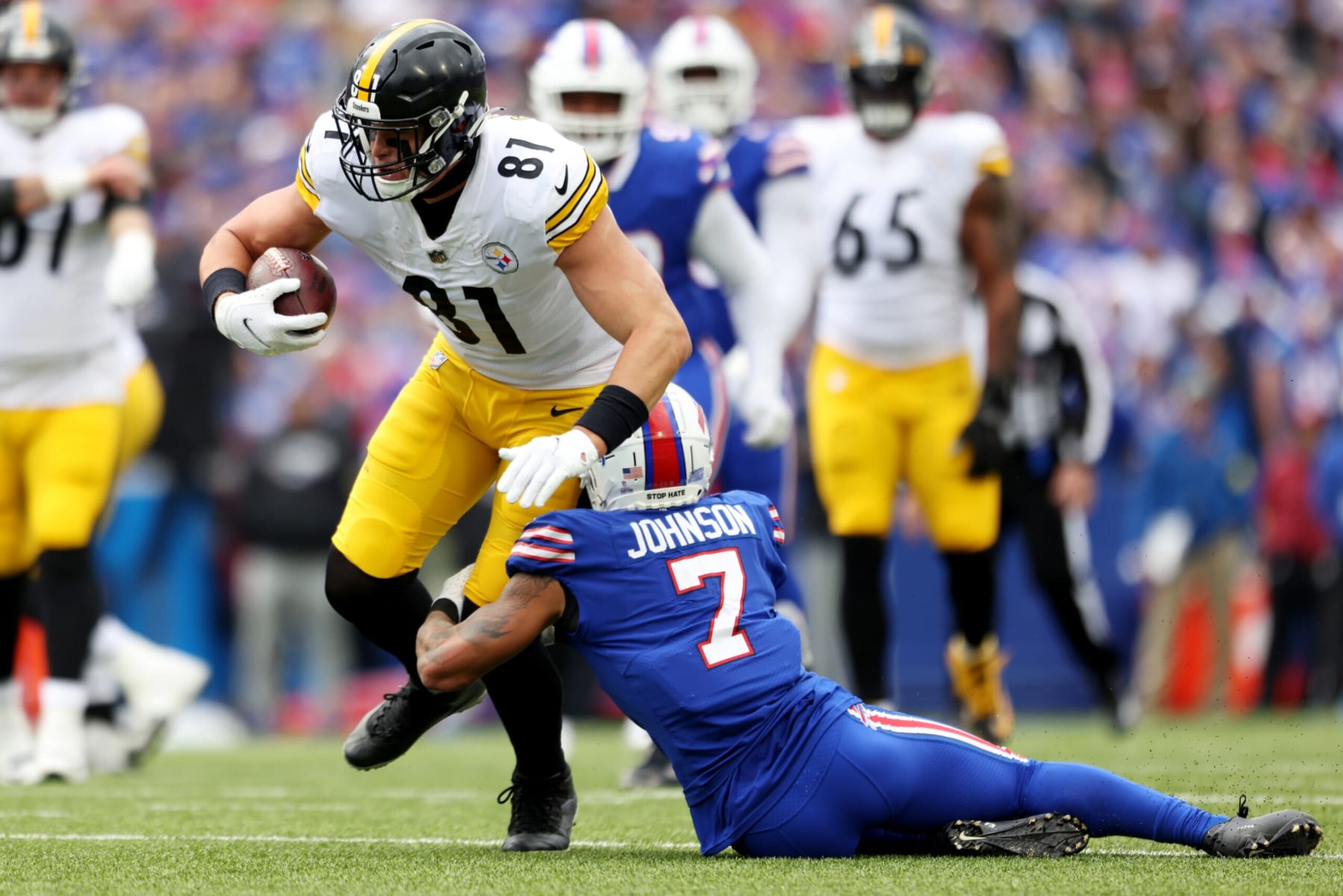 ORCHARD PARK, NEW YORK - OCTOBER 09: Zach Gentry #81 of the Pittsburgh Steelers is tackled by Taron Johnson #7 of the Buffalo Bills during the second half at Highmark Stadium on October 09, 2022 in Orchard Park, New York. (Photo by Bryan M. Bennett/Getty Images)