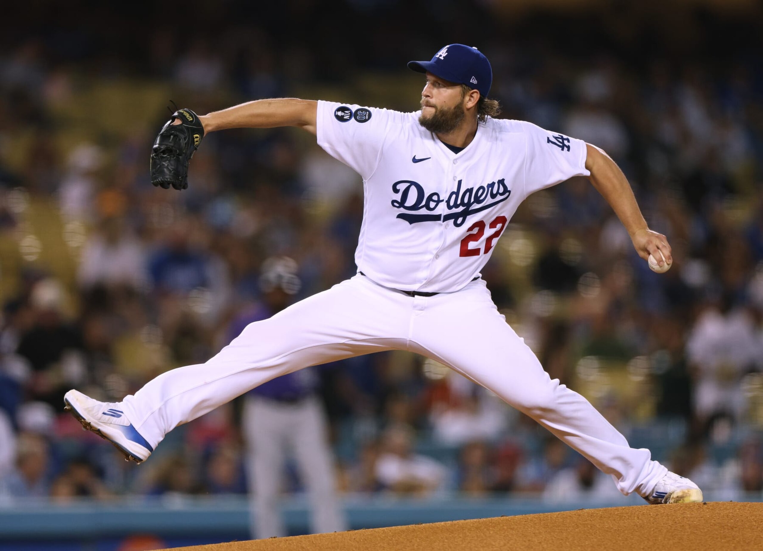 LOS ANGELES, CALIFORNIA - SEPTEMBER 30: Clayton Kershaw #22 of the Los Angeles Dodgers pitches against the Colorado Rockies during the first inning at Dodger Stadium on September 30, 2022 in Los Angeles, California. (Photo by Harry How/Getty Images)
