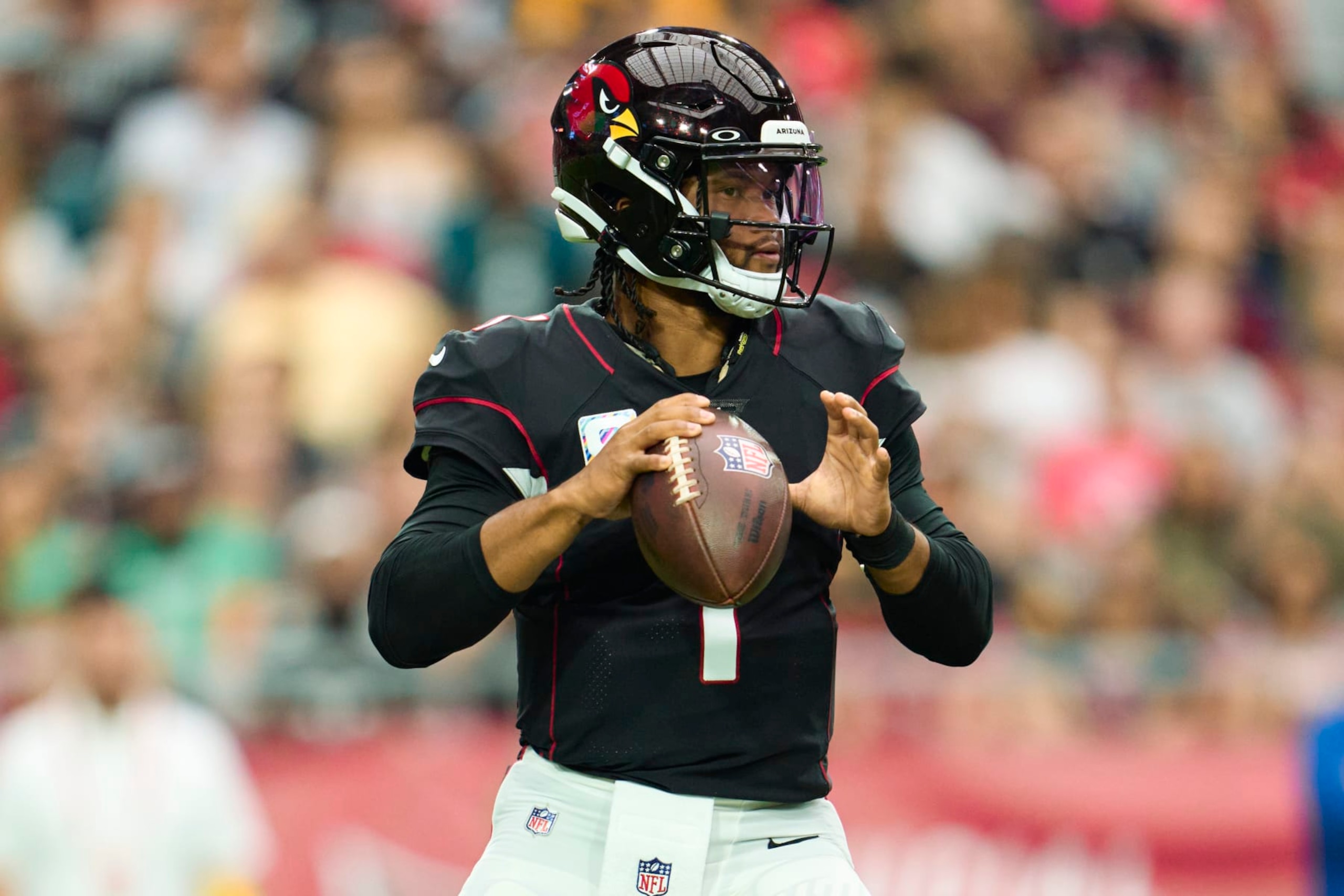 GLENDALE, AZ - OCTOBER 09: Kyler Murray #1 of the Arizona Cardinals drops back to pass against the Philadelphia Eagles at State Farm Stadium on October 9, 2022 in Glendale, Arizona. (Photo by Cooper Neill/Getty Images)