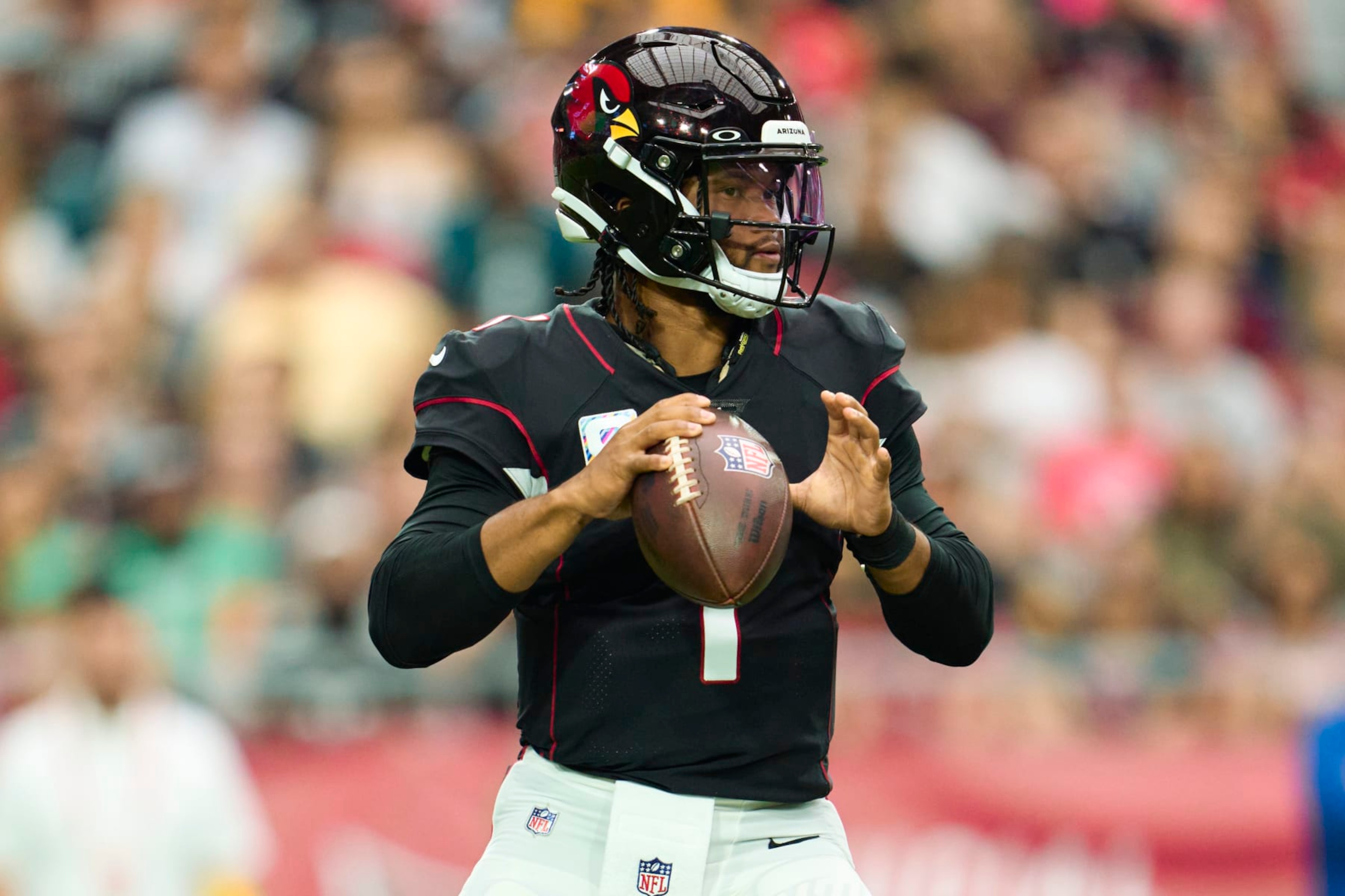 GLENDALE, AZ - OCTOBER 09: Kyler Murray #1 of the Arizona Cardinals drops back to pass against the Philadelphia Eagles at State Farm Stadium on October 9, 2022 in Glendale, Arizona. (Photo by Cooper Neill/Getty Images) GLENDALE, AZ - OCTOBER 09: Kyler Murray #1 of the Arizona Cardinals drops back to pass against the Philadelphia Eagles at State Farm Stadium on October 9, 2022 in Glendale, Arizona. (Photo by Cooper Neill/Getty Images)
