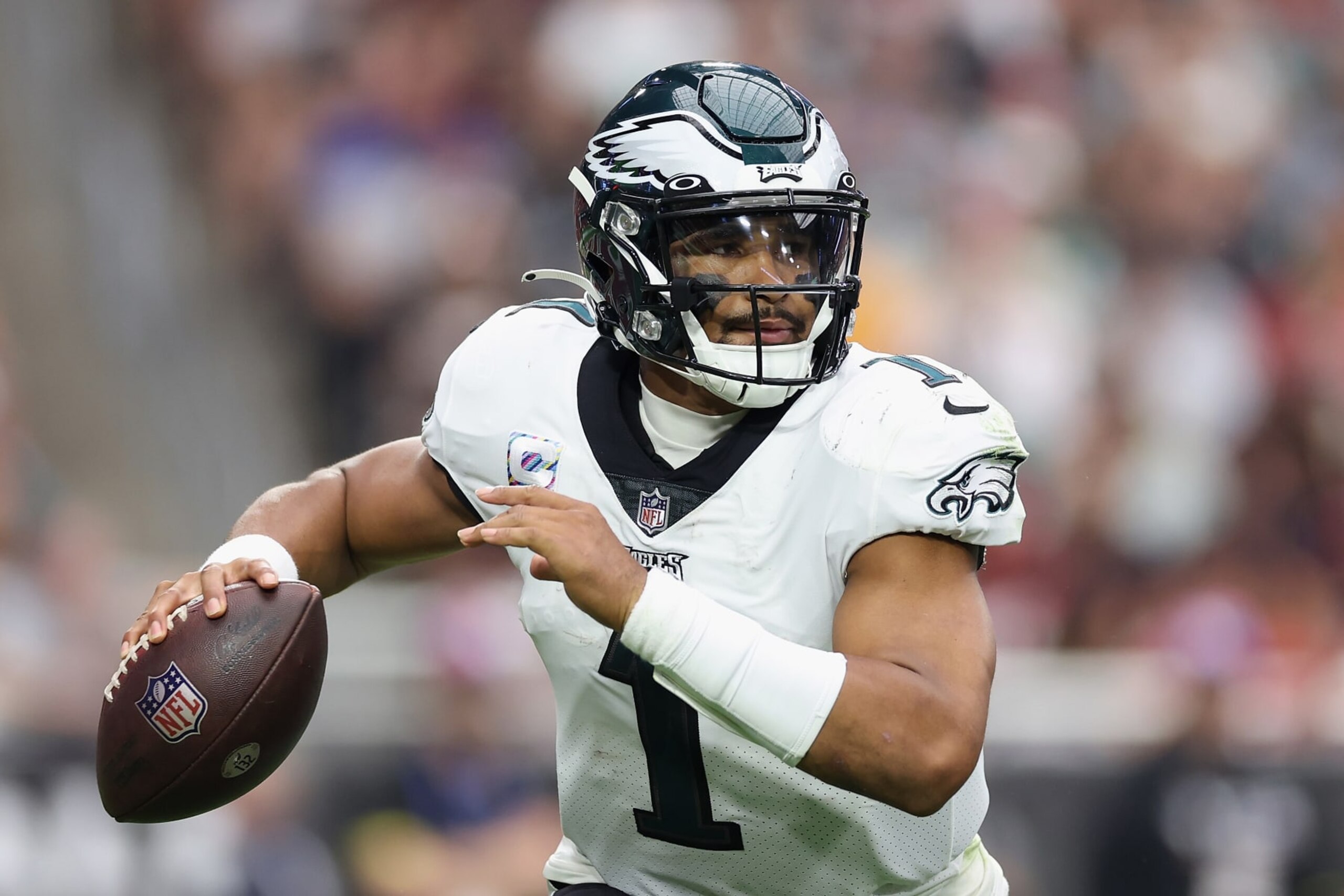 GLENDALE, ARIZONA - OCTOBER 09: Quarterback Jalen Hurts #1 of the Philadelphia Eagles looks to pass during the NFL game at State Farm Stadium on October 09, 2022 in Glendale, Arizona. The Eagles defeated the Cardinals 20-17.  (Photo by Christian Petersen/Getty Images)