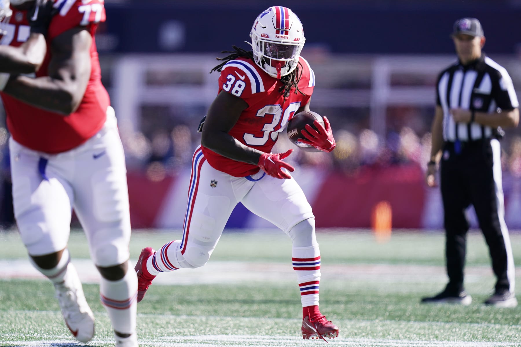 New England Patriots running back Rhamondre Stevenson (38) during an NFL football game, Sunday, Oct. 9, 2022, in Foxborough, Mass. (AP Photo/Charles Krupa)