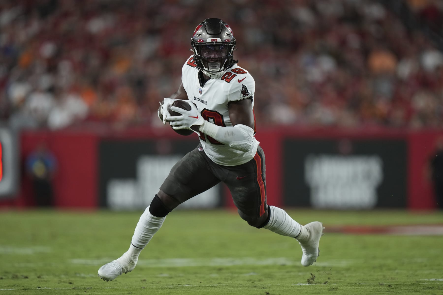 Tampa Bay Buccaneers running back Rachaad White (29) finds running room on the edge during an NFL football game against the ,Kansas City Chiefs Sunday, October 2, 2022 in Tampa, FL. The Chiefs defeat the Buccaneers 41-31. (Peter Joneleit via AP)