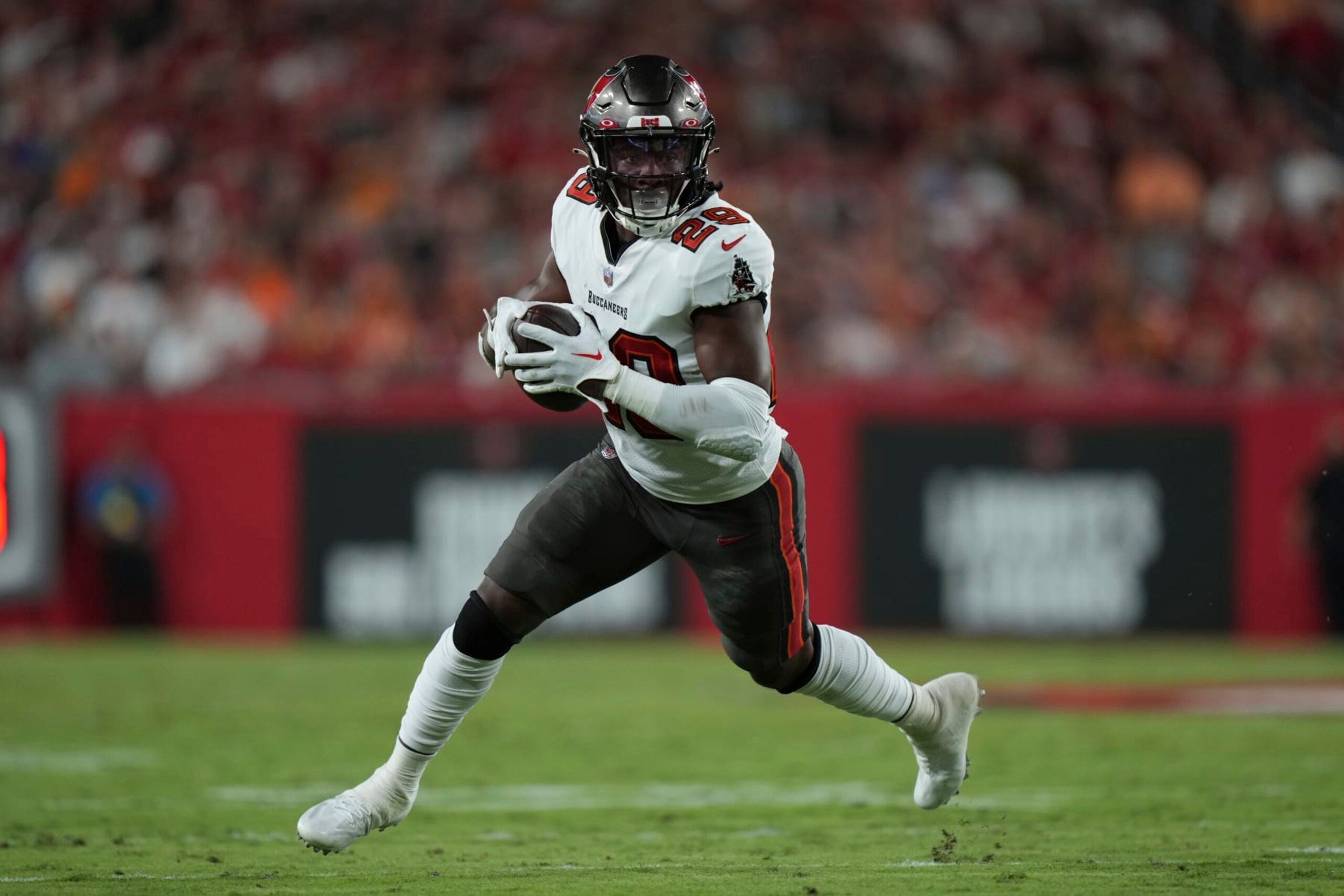 Tampa Bay Buccaneers running back Rachaad White (29) finds running room on the edge during an NFL football game against the ,Kansas City Chiefs Sunday, October 2, 2022 in Tampa, FL. The Chiefs defeat the Buccaneers 41-31. (Peter Joneleit via AP) Tampa Bay Buccaneers running back Rachaad White (29) finds running room on the edge during an NFL football game against the ,Kansas City Chiefs Sunday, October 2, 2022 in Tampa, FL. The Chiefs defeat the Buccaneers 41-31. (Peter Joneleit via AP)