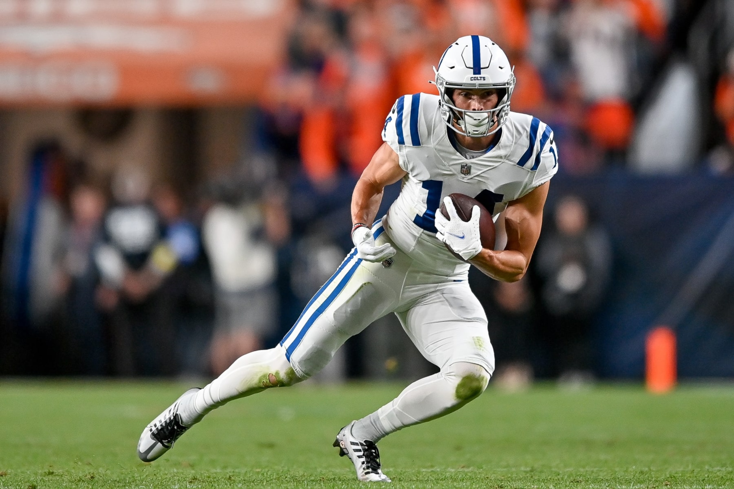 DENVER, COLORADO - OCTOBER 6: Wide receiver Alec Pierce #14 of the Indianapolis Colts runs after a catch against the Denver Broncos at Empower Field at Mile High on October 6, 2022 in Denver, Colorado. (Photo by Dustin Bradford/Getty Images) DENVER, COLORADO - OCTOBER 6: Wide receiver Alec Pierce #14 of the Indianapolis Colts runs after a catch against the Denver Broncos at Empower Field at Mile High on October 6, 2022 in Denver, Colorado. (Photo by Dustin Bradford/Getty Images)