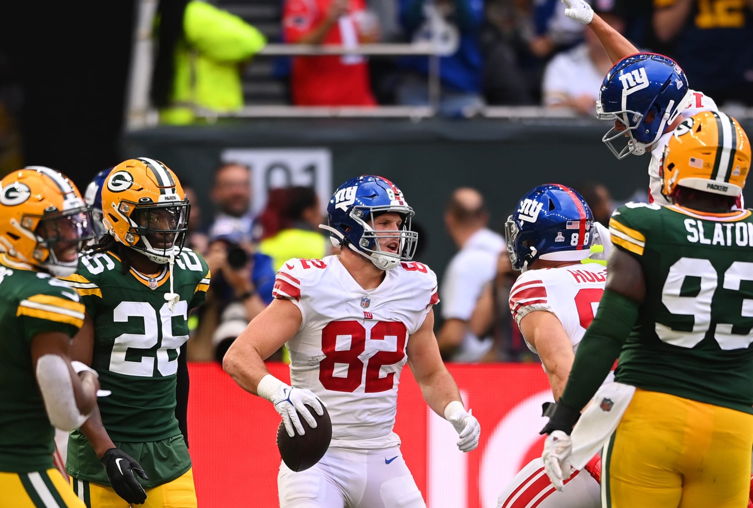 LONDON, ENGLAND - OCTOBER 09: Daniel Bellinger #82 of the New York Giants celebrates a 2 yard touchdown in the second quarter during the NFL match between New York Giants and Green Bay Packers at Tottenham Hotspur Stadium on October 09, 2022 in London, England. (Photo by Stu Forster/Getty Images) LONDON, ENGLAND - OCTOBER 09: Daniel Bellinger #82 of the New York Giants celebrates a 2 yard touchdown in the second quarter during the NFL match between New York Giants and Green Bay Packers at Tottenham Hotspur Stadium on October 09, 2022 in London, England. (Photo by Stu Forster/Getty Images)