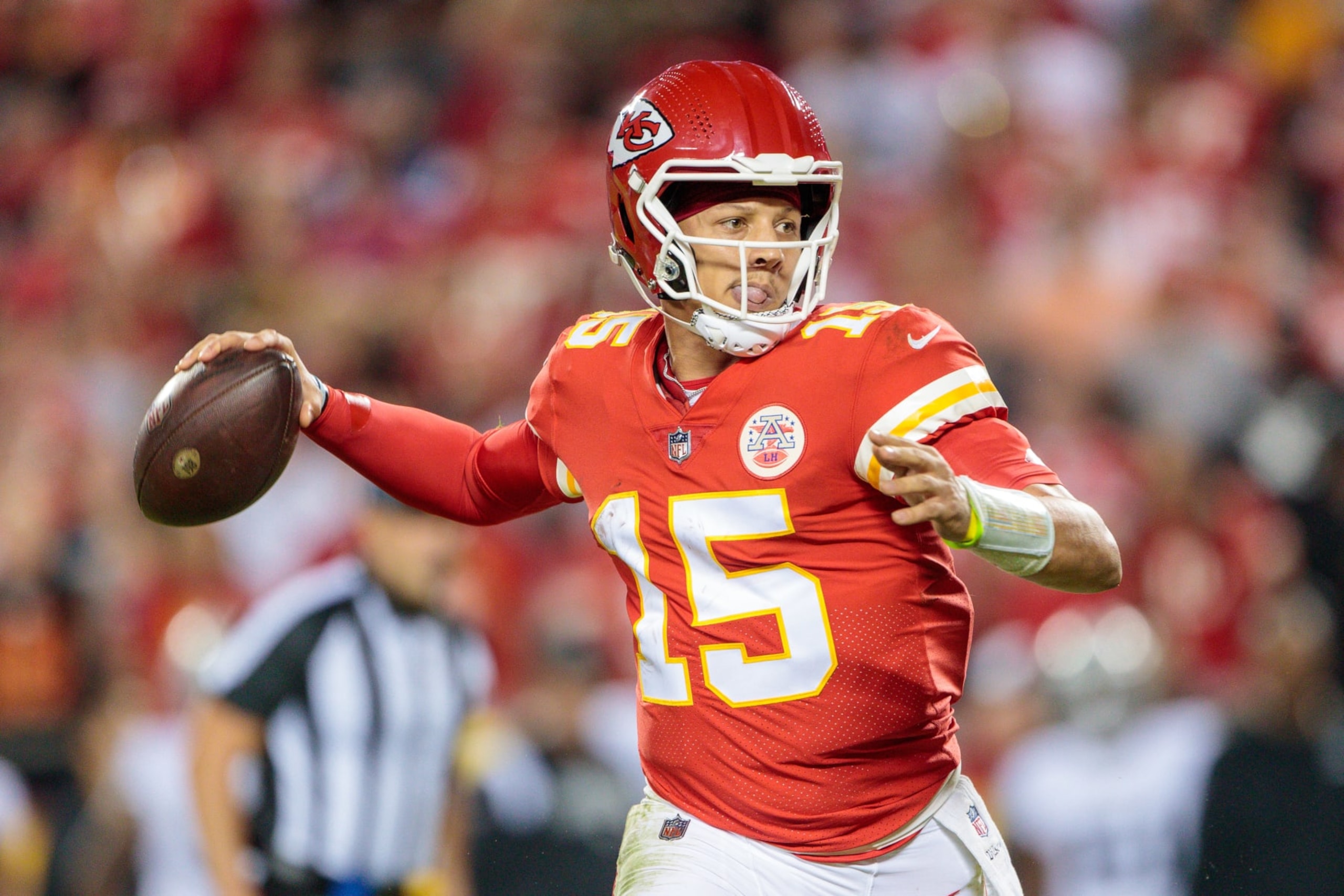 KANSAS CITY, MO - OCTOBER 10: Kansas City Chiefs quarterback Patrick Mahomes (15) looks to pass during the second half against the Las Vegas Raiders on October 10th, 2022 at GEHA field in Kansas City, Missouri. (Photo by William Purnell/Icon Sportswire via Getty Images)