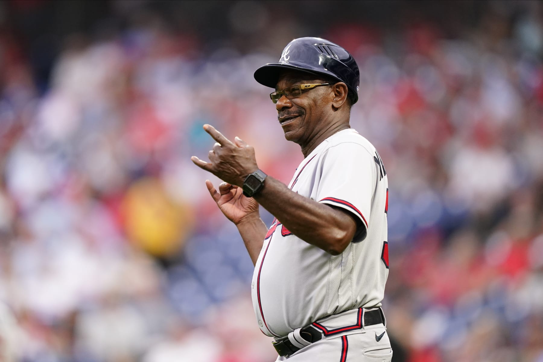 Atlanta Braves' Ron Washington reacts during a baseball game, Tuesday, July 26, 2022, in Philadelphia. (AP Photo/Matt Slocum)