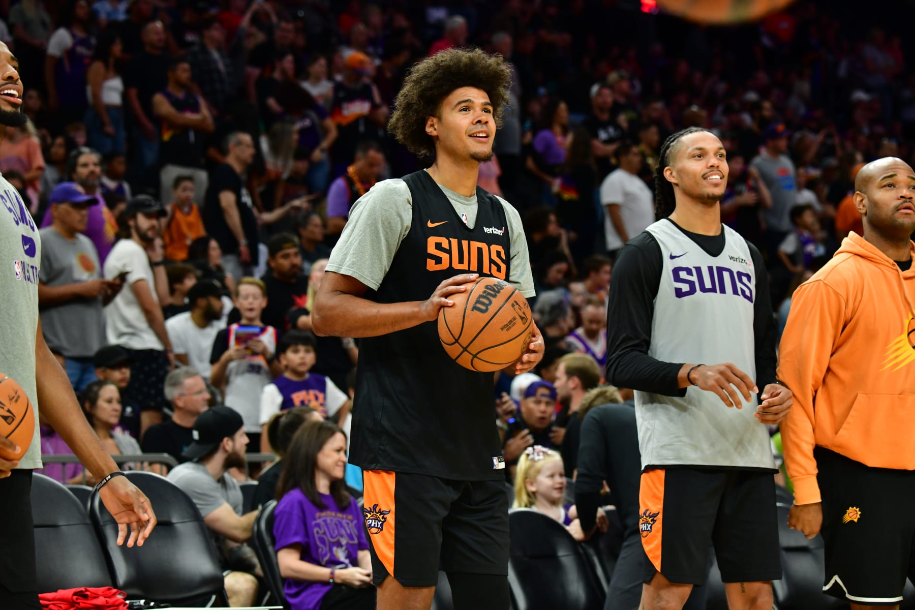 PHOENIX, AZ - OCTOBER 1 - Cameron Johnson #23  and Damion Lee #10 of the Phoenix Suns look on during the Phoenix Suns open practice on October 1, 2022, at the Footprint Center in Phoenix, Arizona. NOTE TO USER: User expressly acknowledges and agrees that, by downloading and or using this Photograph, user is consenting to the terms and conditions of the Getty Images License Agreement. Mandatory Copyright Notice: Copyright 2022 NBAE (Photo by Barry Gossage / NBAE via Getty Images)