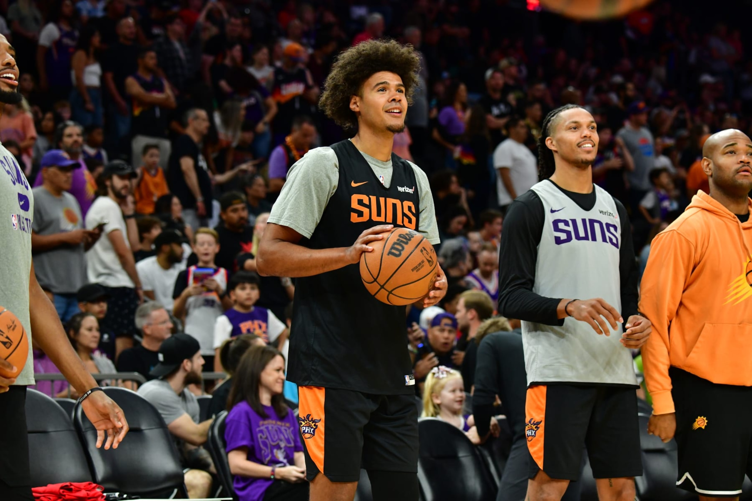 PHOENIX, AZ - OCTOBER 1 - Cameron Johnson #23  and Damion Lee #10 of the Phoenix Suns look on during the Phoenix Suns open practice on October 1, 2022, at the Footprint Center in Phoenix, Arizona. NOTE TO USER: User expressly acknowledges and agrees that, by downloading and or using this Photograph, user is consenting to the terms and conditions of the Getty Images License Agreement. Mandatory Copyright Notice: Copyright 2022 NBAE (Photo by Barry Gossage / NBAE via Getty Images)