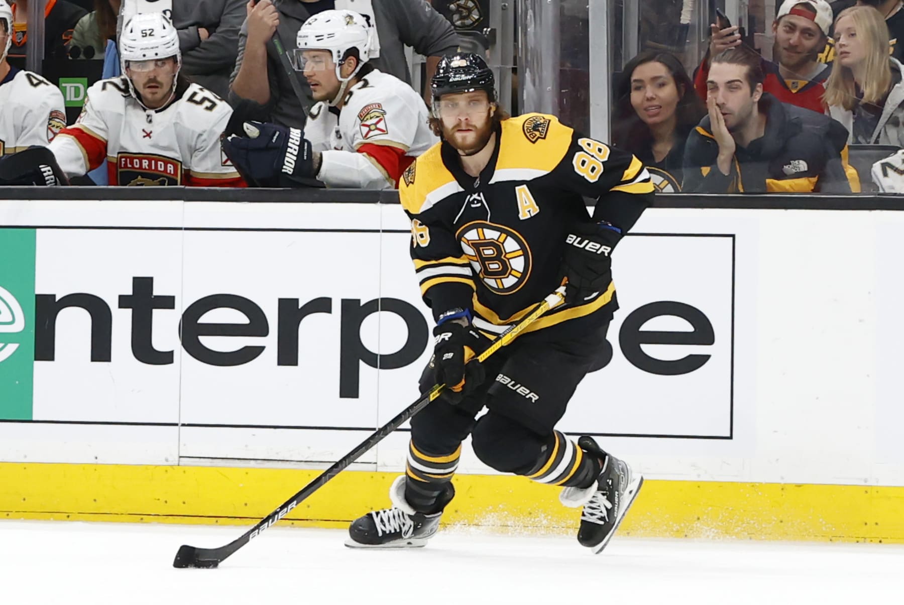 BOSTON, MA - APRIL 26: Boston Bruins right wing David Pastrnak (88) holds the puck on the power play during a game between the Boston Bruins and the Florida Panthers on April 26, 2022, at TD Garden in Boston, Massachusetts. (Photo by Fred Kfoury III/Icon Sportswire via Getty Images)