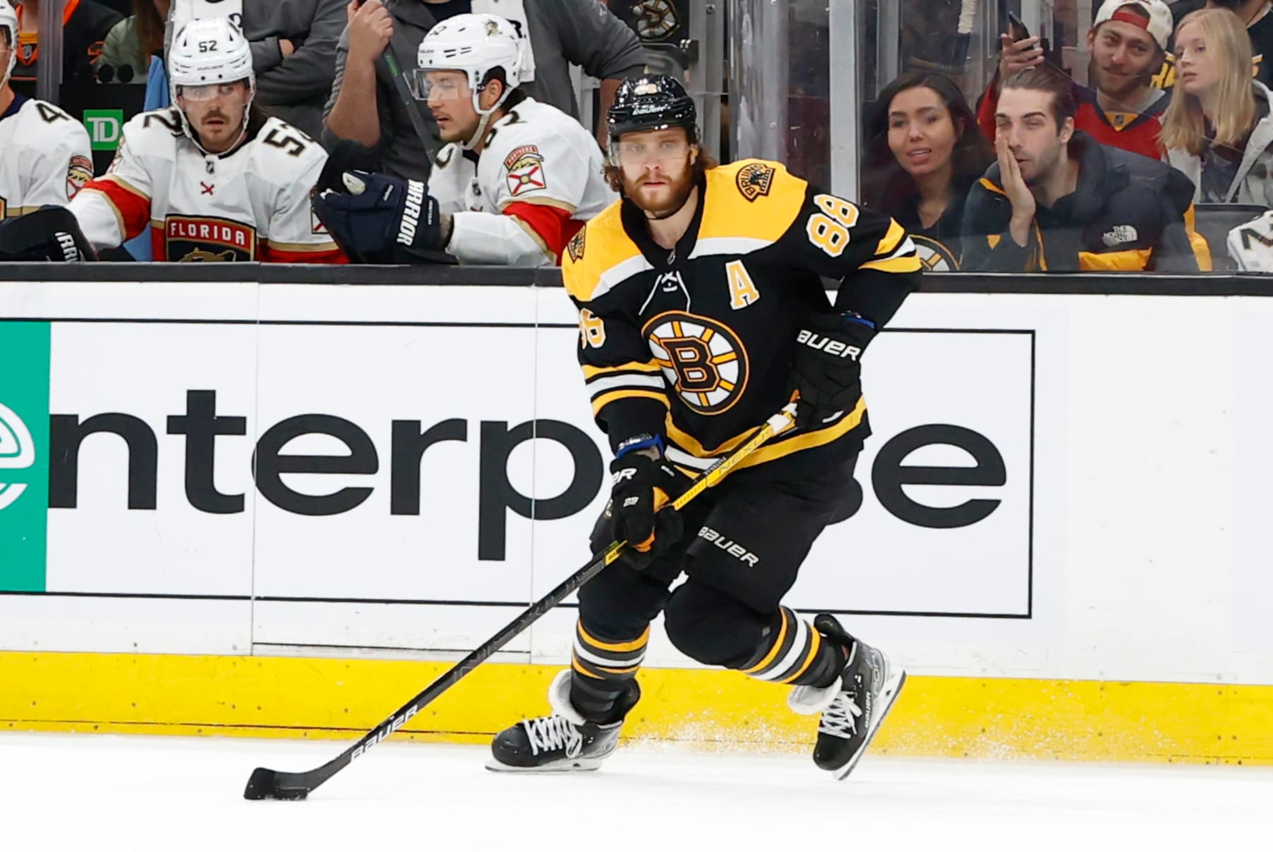 BOSTON, MA - APRIL 26: Boston Bruins right wing David Pastrnak (88) holds the puck on the power play during a game between the Boston Bruins and the Florida Panthers on April 26, 2022, at TD Garden in Boston, Massachusetts. (Photo by Fred Kfoury III/Icon Sportswire via Getty Images)