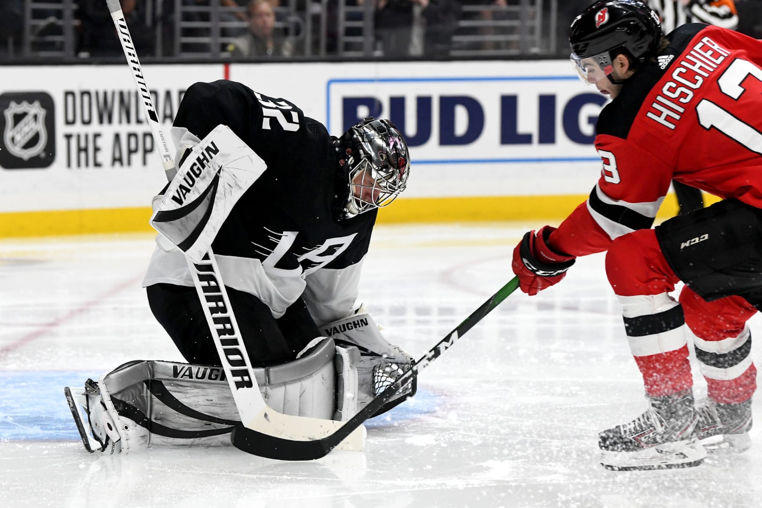 LOS ANGELES, CA - FEBRUARY 29: Los Angeles Kings Goalie Jonathan Quick (32) makes a save during the third period as New Jersey Devils Center Nico Hischier (13) looks for a rebound during their game on February 29, 2020, at the Staples Center in Los Angeles, CA. (Photo by Rob Curtis/Icon Sportswire via Getty Images) LOS ANGELES, CA - FEBRUARY 29: Los Angeles Kings Goalie Jonathan Quick (32) makes a save during the third period as New Jersey Devils Center Nico Hischier (13) looks for a rebound during their game on February 29, 2020, at the Staples Center in Los Angeles, CA. (Photo by Rob Curtis/Icon Sportswire via Getty Images)