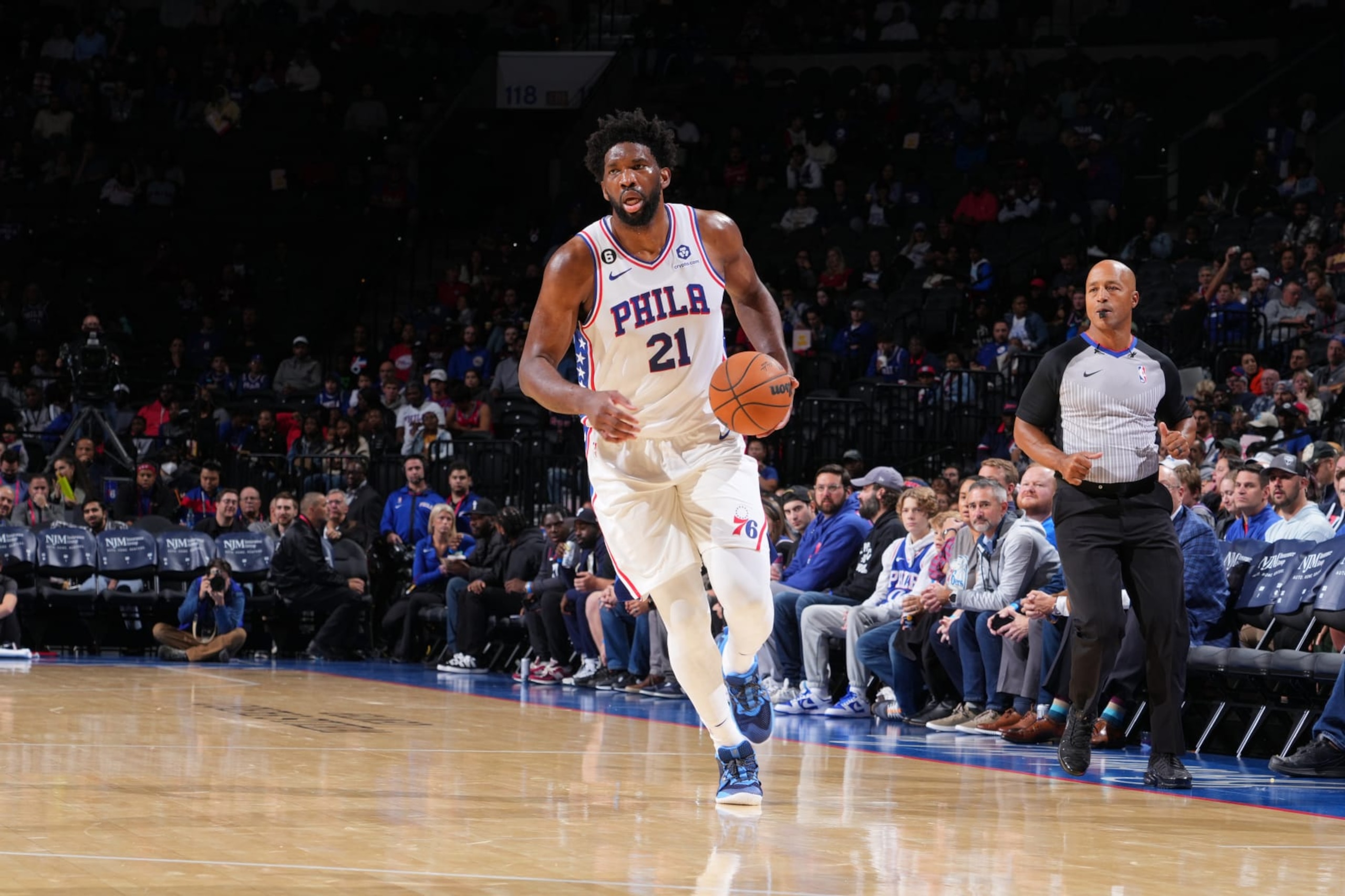 PHILADELPHIA, PA - OCTOBER 5: Joel Embiid #21 of the Philadelphia 76ers dribbles the ball against the Cleveland Cavaliers during a preseason game on October 5, 2022 at the Wells Fargo Center in Philadelphia, Pennsylvania NOTE TO USER: User expressly acknowledges and agrees that, by downloading and/or using this Photograph, user is consenting to the terms and conditions of the Getty Images License Agreement. Mandatory Copyright Notice: Copyright 2022 NBAE (Photo by Jesse D. Garrabrant/NBAE via Getty Images) PHILADELPHIA, PA - OCTOBER 5: Joel Embiid #21 of the Philadelphia 76ers dribbles the ball against the Cleveland Cavaliers during a preseason game on October 5, 2022 at the Wells Fargo Center in Philadelphia, Pennsylvania NOTE TO USER: User expressly acknowledges and agrees that, by downloading and/or using this Photograph, user is consenting to the terms and conditions of the Getty Images License Agreement. Mandatory Copyright Notice: Copyright 2022 NBAE (Photo by Jesse D. Garrabrant/NBAE via Getty Images)