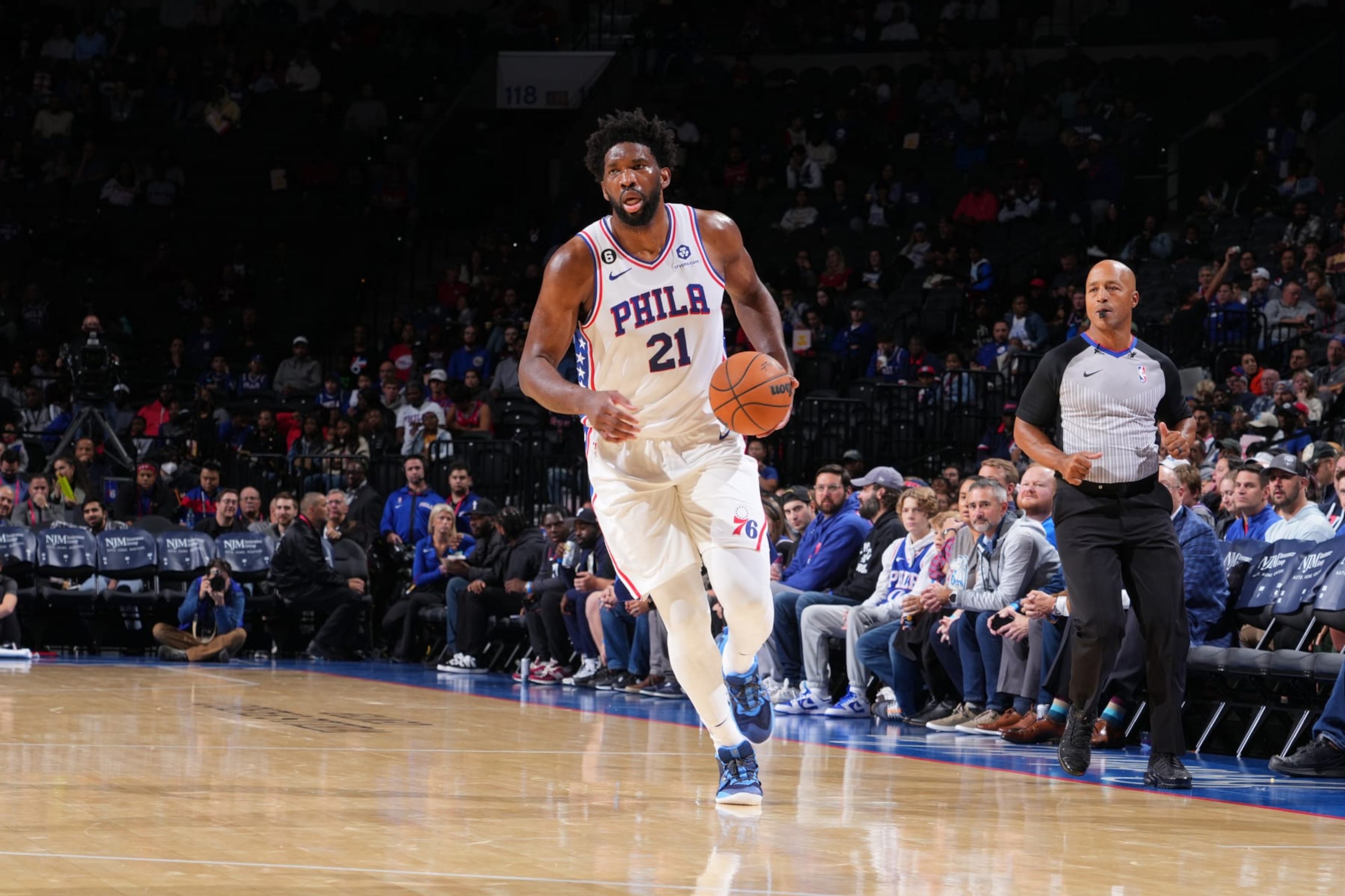 PHILADELPHIA, PA - OCTOBER 5: Joel Embiid #21 of the Philadelphia 76ers dribbles the ball against the Cleveland Cavaliers during a preseason game on October 5, 2022 at the Wells Fargo Center in Philadelphia, Pennsylvania NOTE TO USER: User expressly acknowledges and agrees that, by downloading and/or using this Photograph, user is consenting to the terms and conditions of the Getty Images License Agreement. Mandatory Copyright Notice: Copyright 2022 NBAE (Photo by Jesse D. Garrabrant/NBAE via Getty Images) PHILADELPHIA, PA - OCTOBER 5: Joel Embiid #21 of the Philadelphia 76ers dribbles the ball against the Cleveland Cavaliers during a preseason game on October 5, 2022 at the Wells Fargo Center in Philadelphia, Pennsylvania NOTE TO USER: User expressly acknowledges and agrees that, by downloading and/or using this Photograph, user is consenting to the terms and conditions of the Getty Images License Agreement. Mandatory Copyright Notice: Copyright 2022 NBAE (Photo by Jesse D. Garrabrant/NBAE via Getty Images)