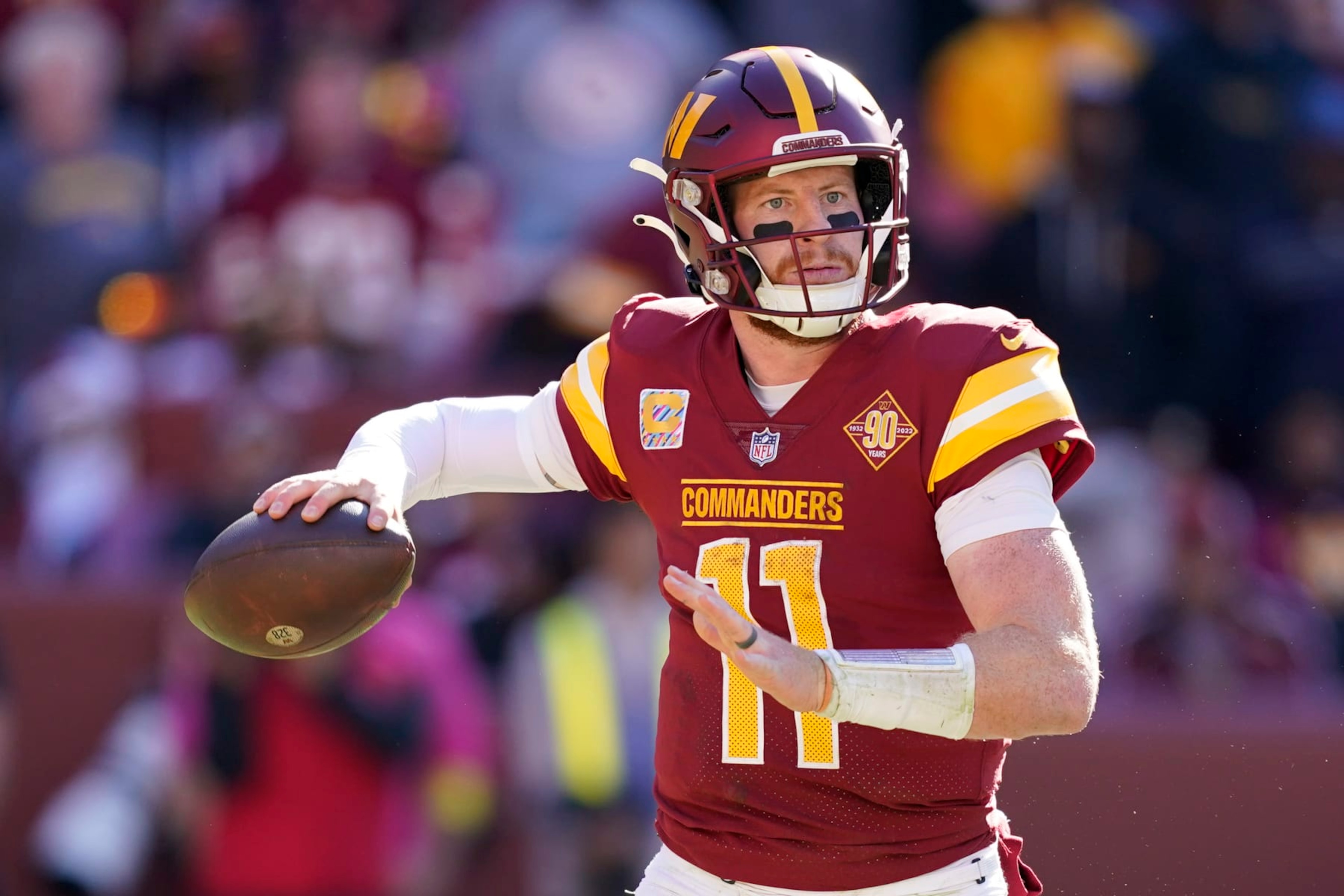 Washington Commanders quarterback Carson Wentz throws to a receiver in the second half of an NFL football game against the Tennessee Titans, Sunday, Oct. 9, 2022, in Landover, Md. (AP Photo/Alex Brandon) Washington Commanders quarterback Carson Wentz throws to a receiver in the second half of an NFL football game against the Tennessee Titans, Sunday, Oct. 9, 2022, in Landover, Md. (AP Photo/Alex Brandon)