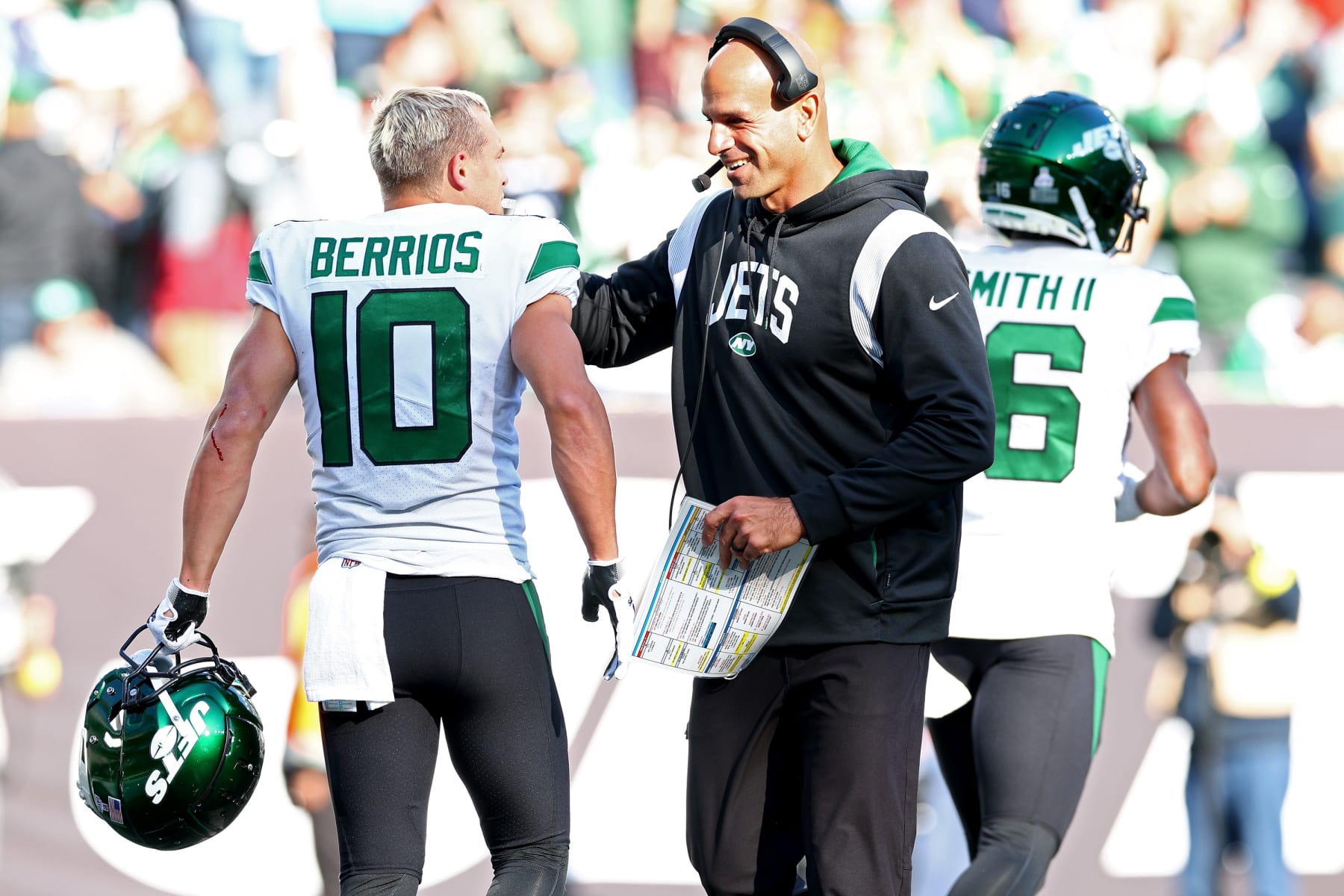 EAST RUTHERFORD, NEW JERSEY - OCTOBER 09: Braxton Berrios #10 of the New York Jets celebrates a touchdown against the Miami Dolphins with head coach Robert Saleh of the New York Jets during the fourth quarter at MetLife Stadium on October 09, 2022 in East Rutherford, New Jersey. (Photo by Elsa/Getty Images)