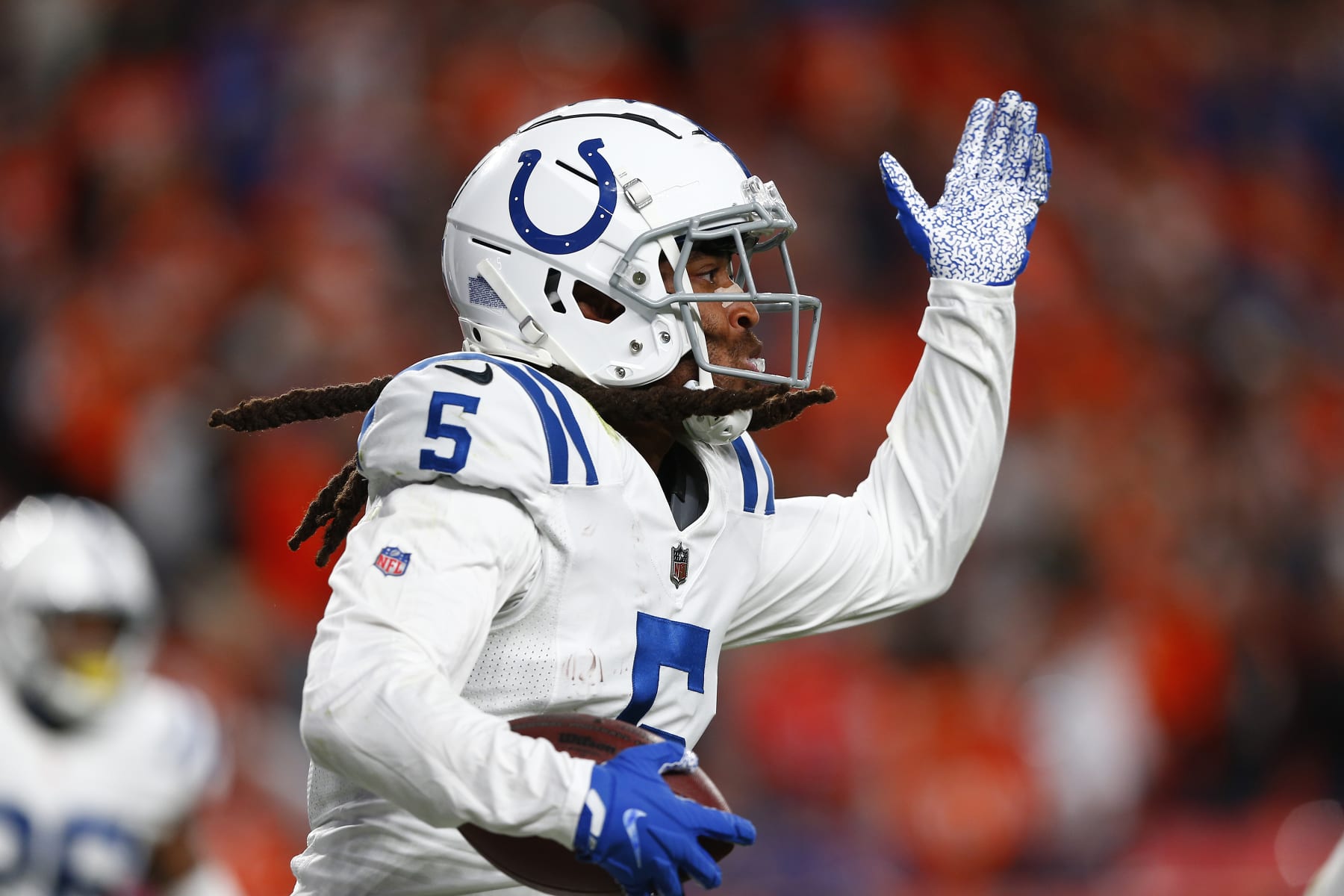 DENVER, CO - OCTOBER 06: Indianapolis Colts Cornerback Stephon Gilmore (5) celebrates his interception in the end zone late in the fourth quarter of play during and NFL game between the Indianapolis Colts and the Denver Broncos on October 06, 2022 at Empower Field at Mile High in Denver CO. (Photo by Jeffrey Brown/Icon Sportswire via Getty Images)