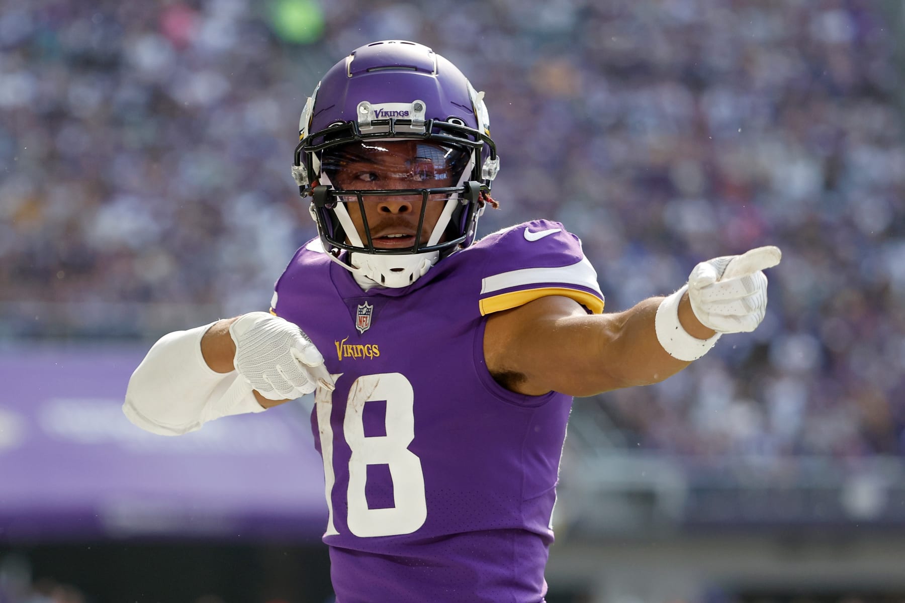 MINNEAPOLIS, MINNESOTA - OCTOBER 09: Justin Jefferson #18 of the Minnesota Vikings celebrates a first down catch against the Chicago Bears during the first quarter at U.S. Bank Stadium on October 09, 2022 in Minneapolis, Minnesota. (Photo by David Berding/Getty Images)