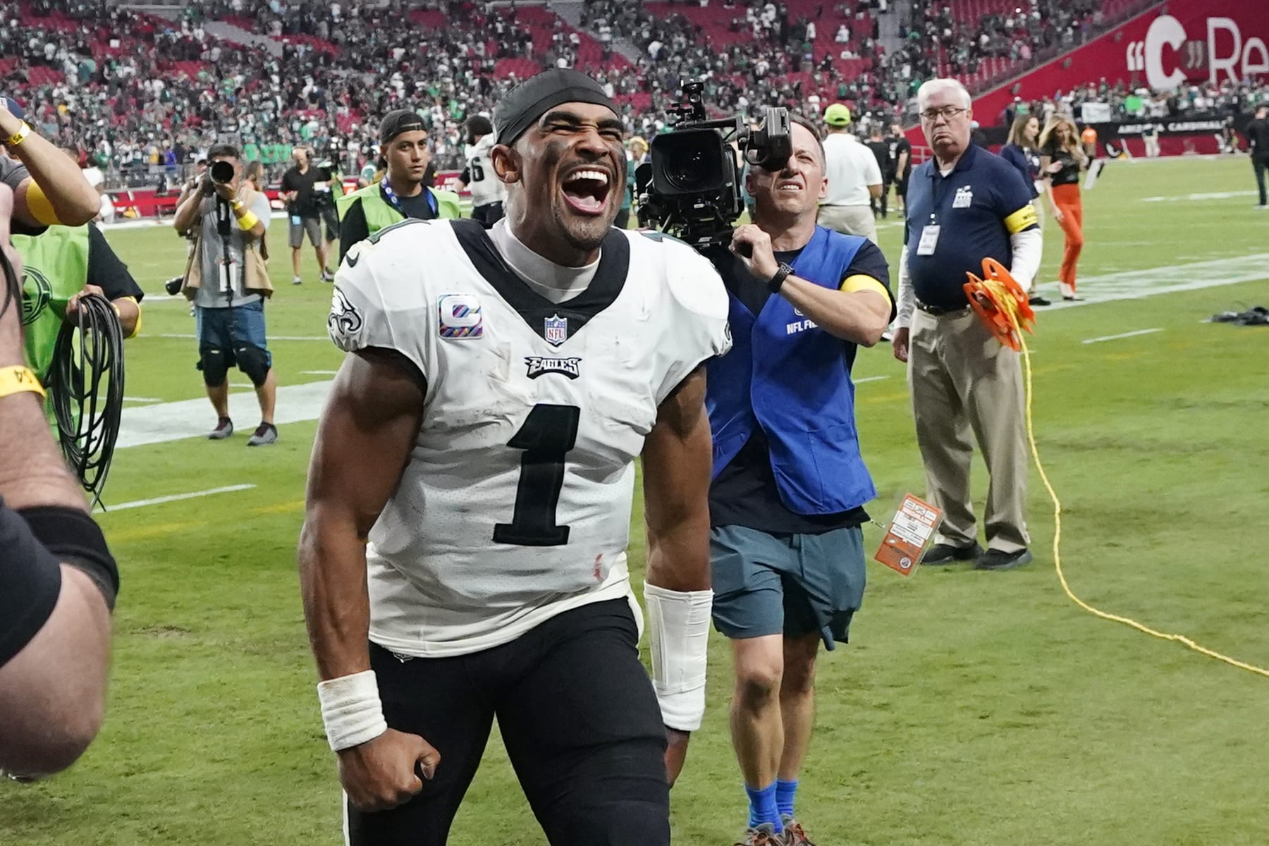 Philadelphia Eagles quarterback Jalen Hurts shouts in celebration after an NFL football game against the Arizona Cardinals in Glendale, Ariz., Sunday, Oct. 9, 2022. The Eagles won 20-17. (AP Photo/Ross D. Franklin)