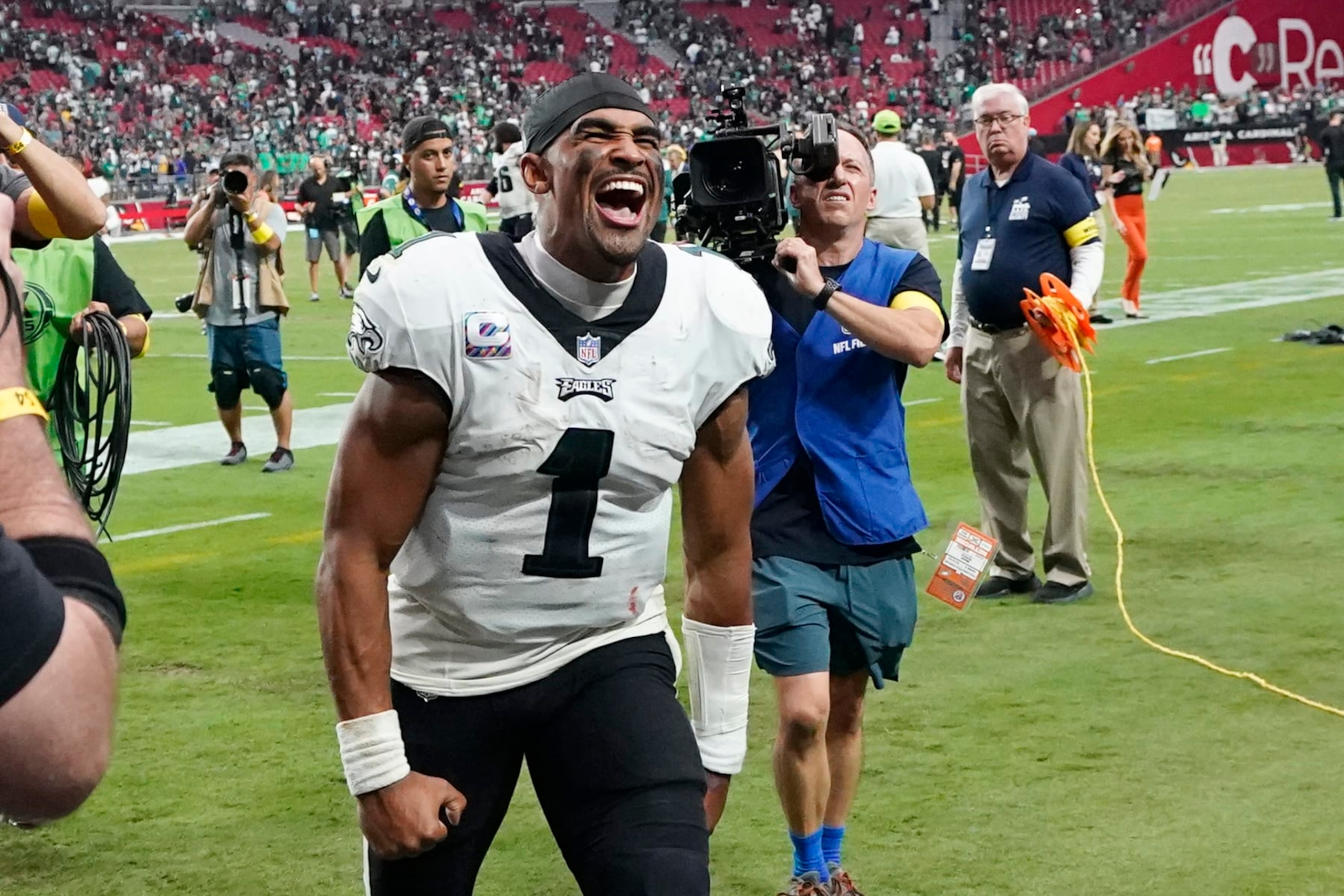 Philadelphia Eagles quarterback Jalen Hurts shouts in celebration after an NFL football game against the Arizona Cardinals in Glendale, Ariz., Sunday, Oct. 9, 2022. The Eagles won 20-17. (AP Photo/Ross D. Franklin)