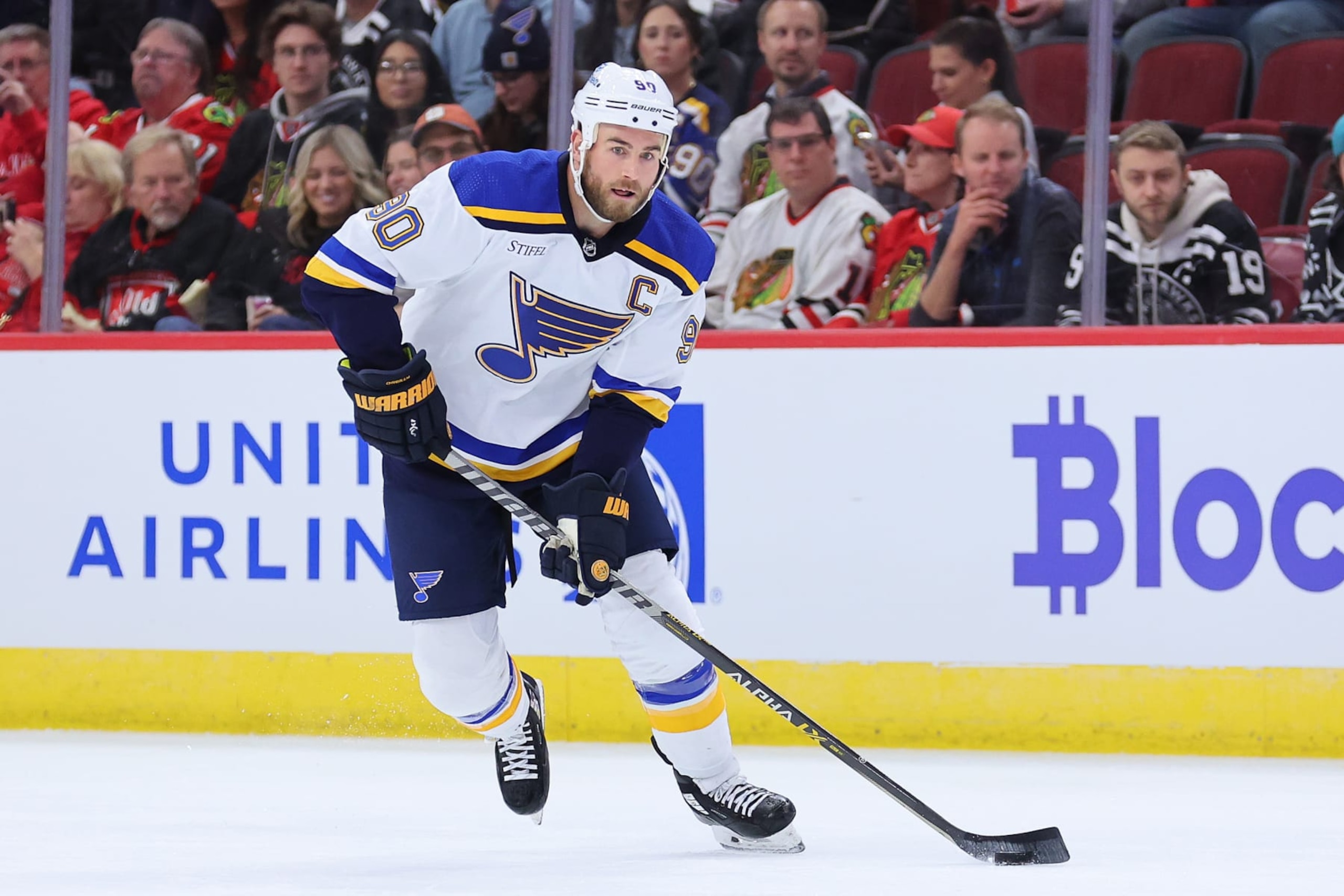 CHICAGO, ILLINOIS - SEPTEMBER 27: Ryan O'Reilly #90 of the St. Louis Blues skates with the puck against the Chicago Blackhawks during the first period of a preseason at United Center on September 27, 2022 in Chicago, Illinois. (Photo by Michael Reaves/Getty Images)